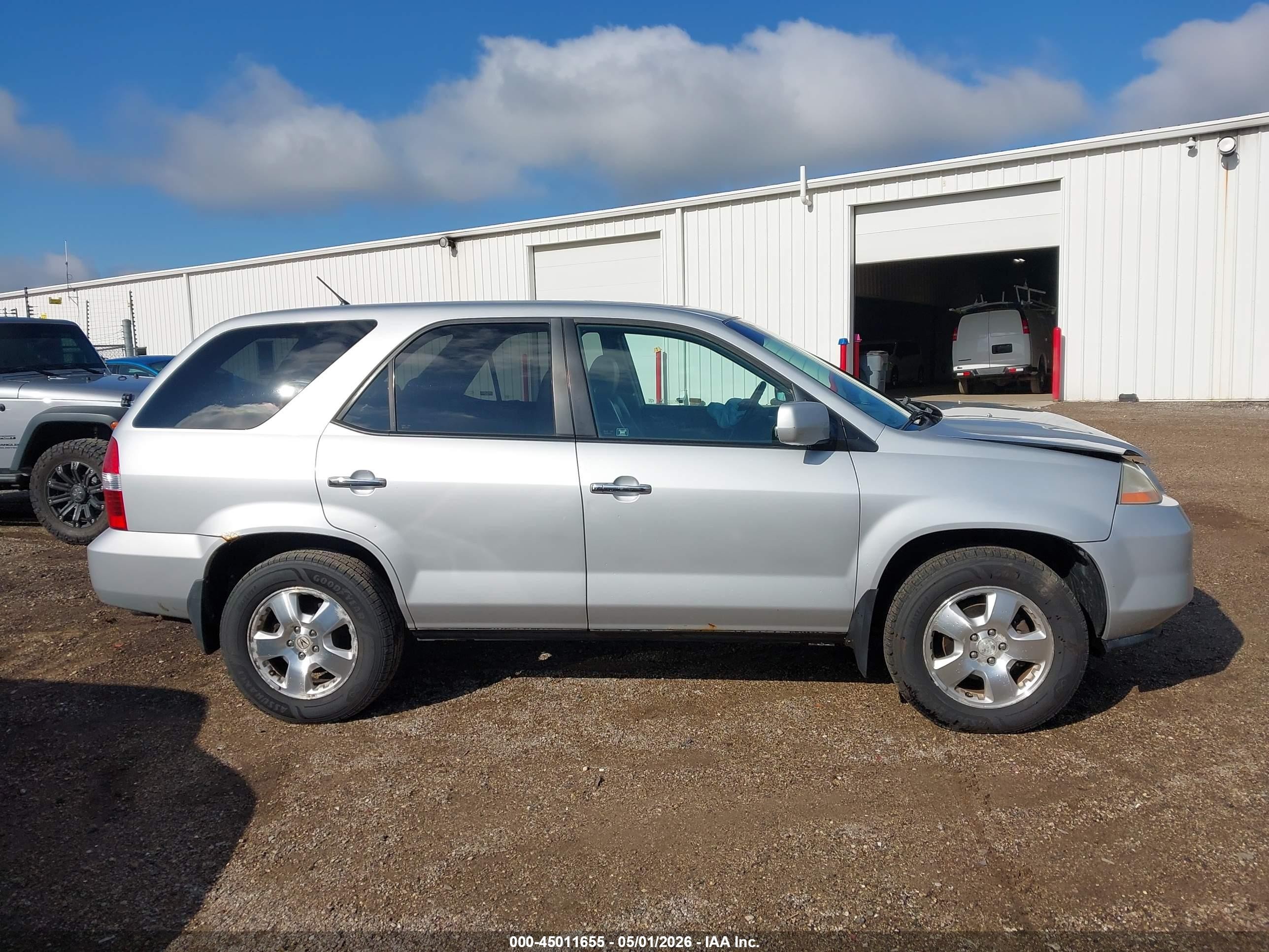 2003 Acura Mdx   Silver vin: 2HNYD18273H526624
