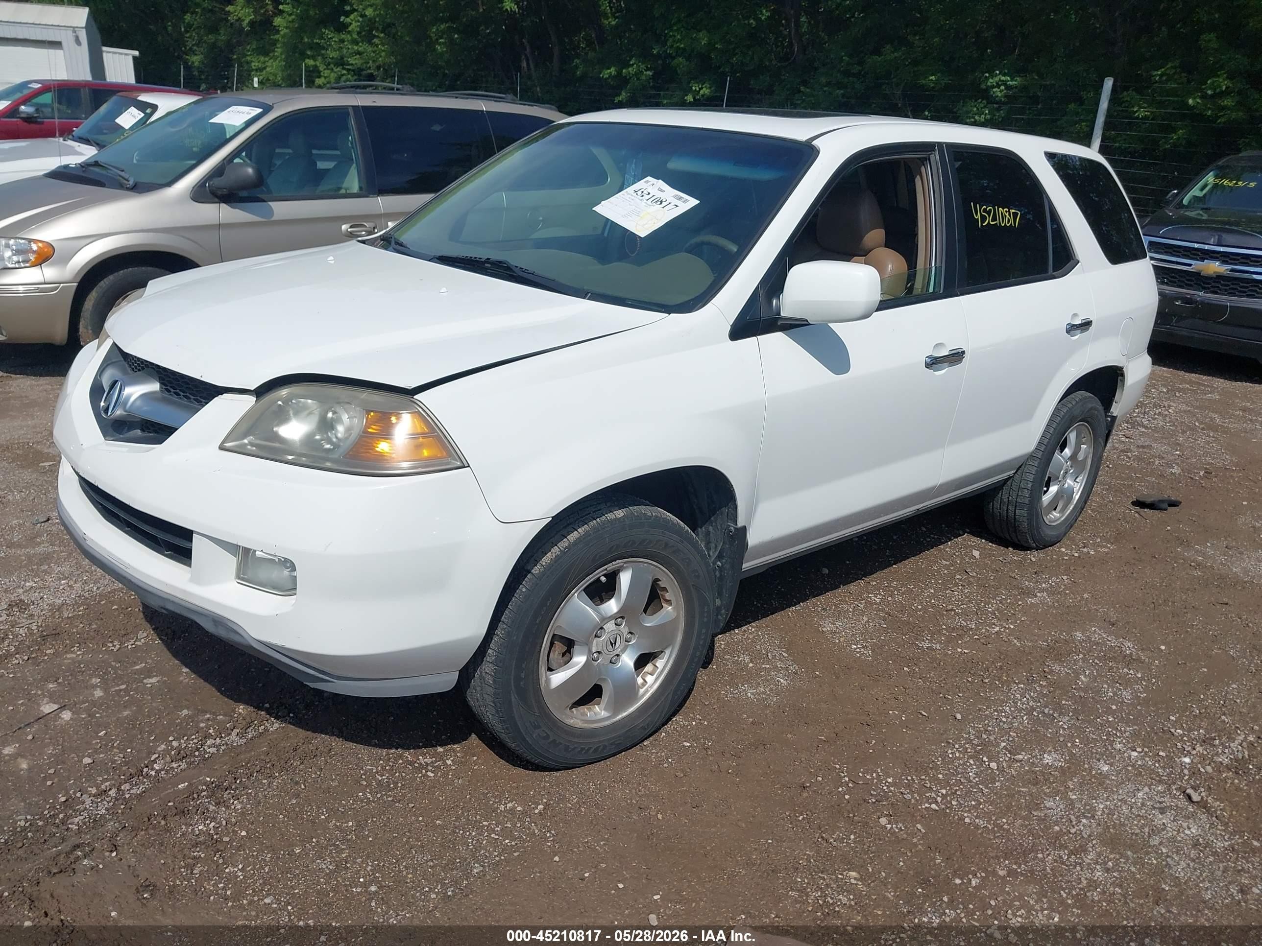 2005 Acura Mdx   White vin: 2HNYD18285H548375