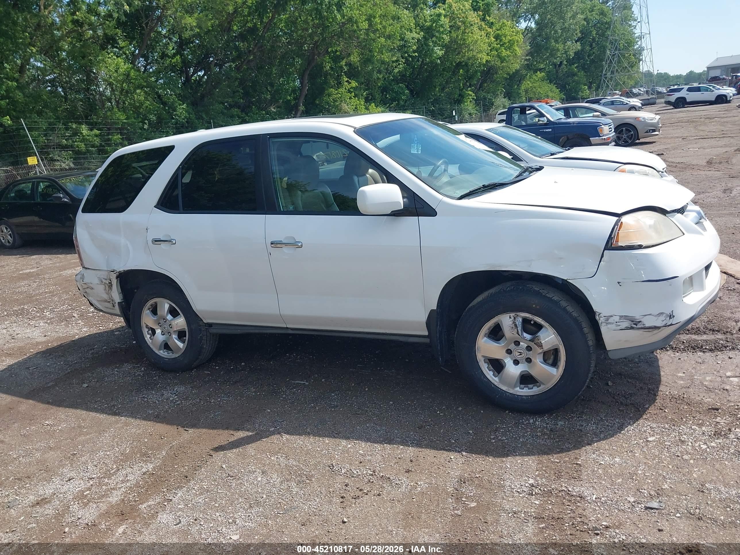2005 Acura Mdx   White vin: 2HNYD18285H548375