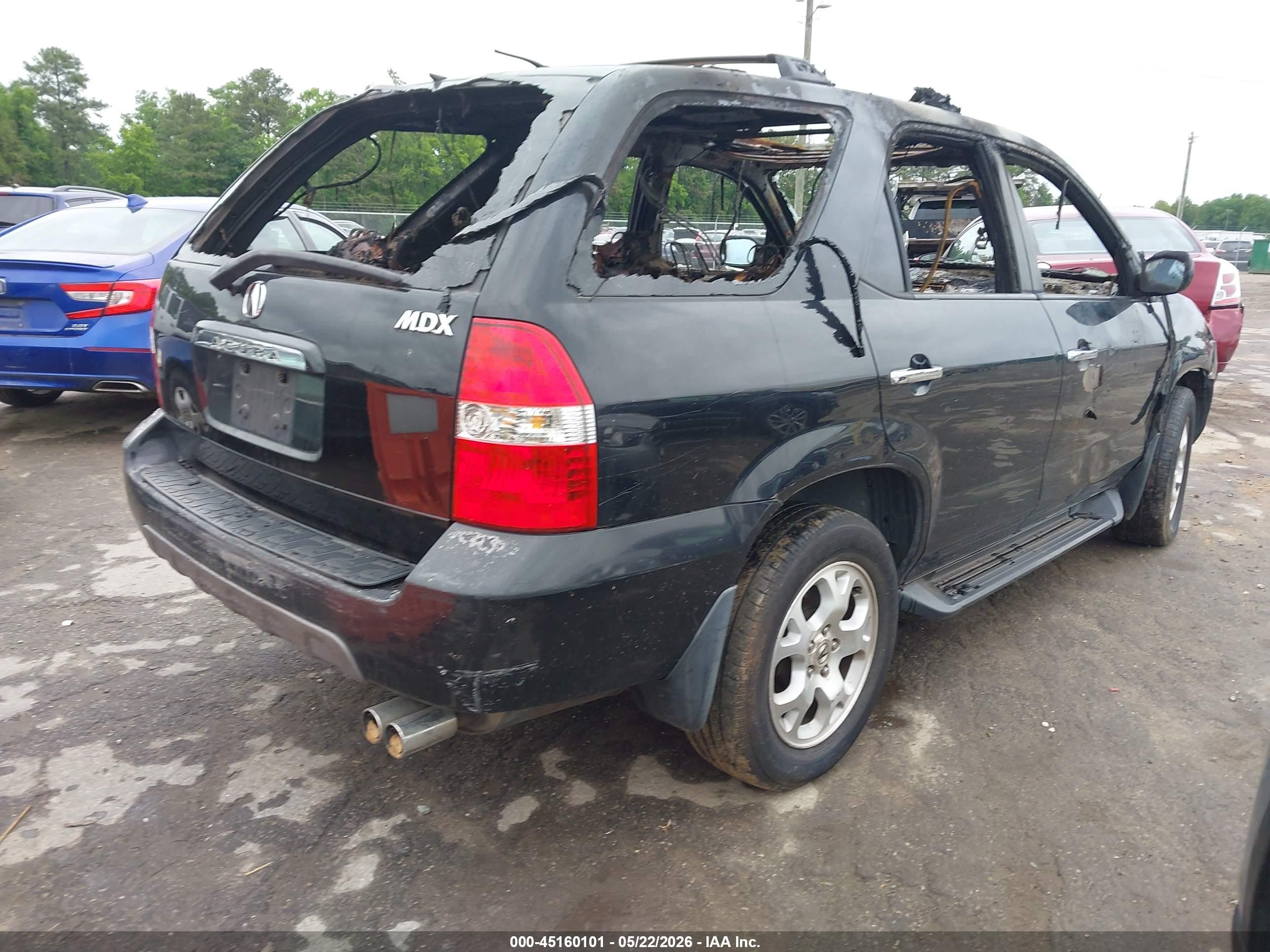 2002 Acura Mdx   Black vin: 2HNYD18602H517958