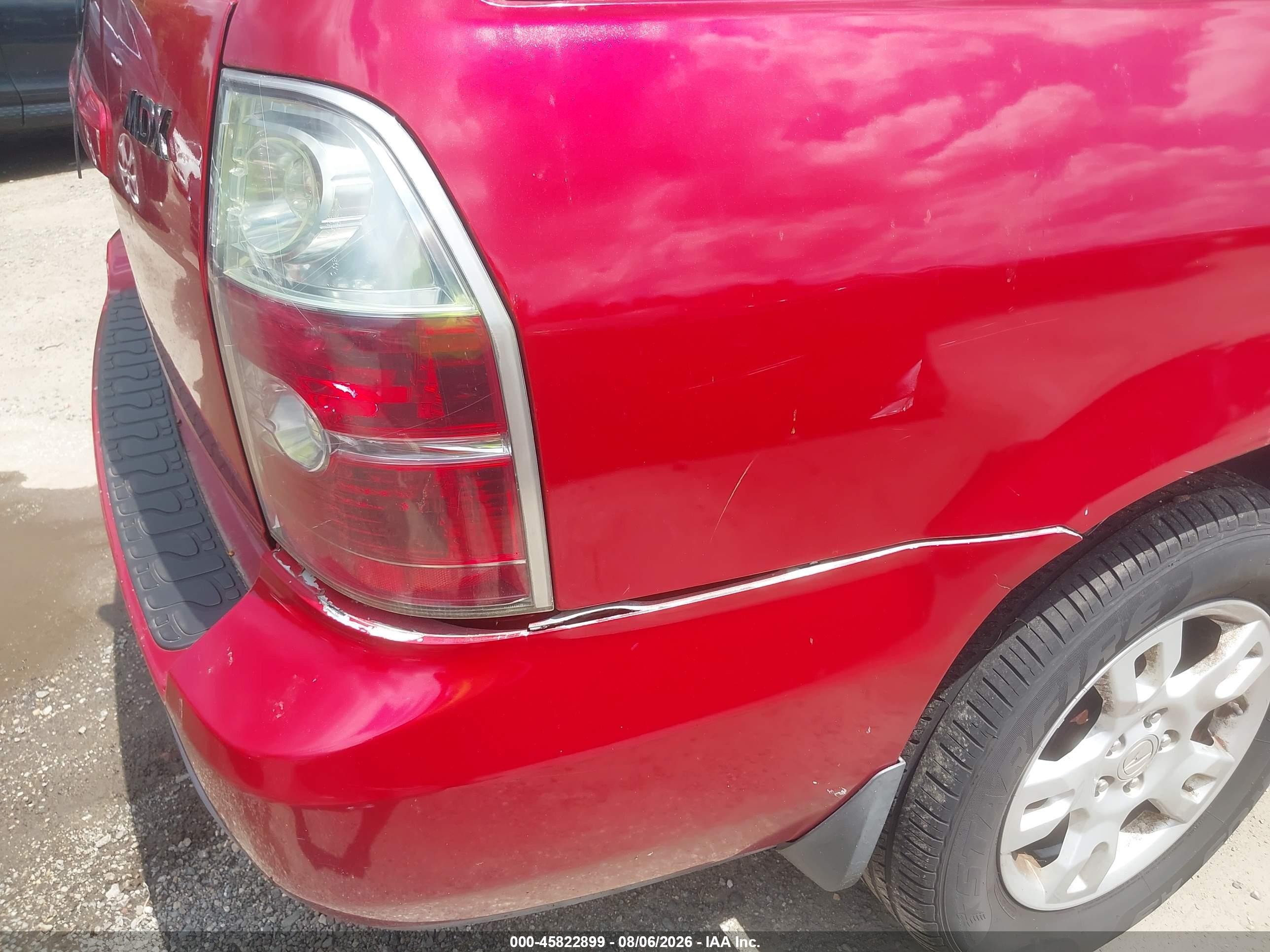 2004 Acura Mdx   Red vin: 2HNYD18604H508602