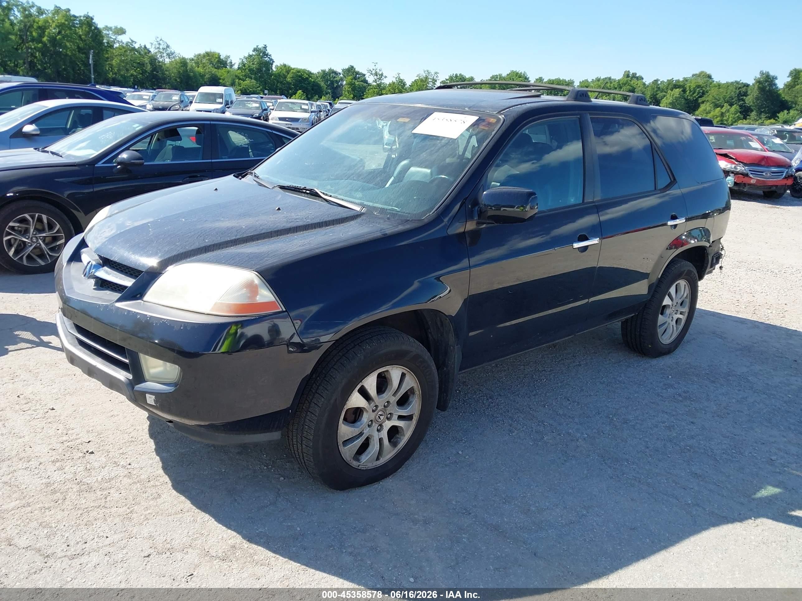 2003 Acura Mdx   Black vin: 2HNYD18613H554471