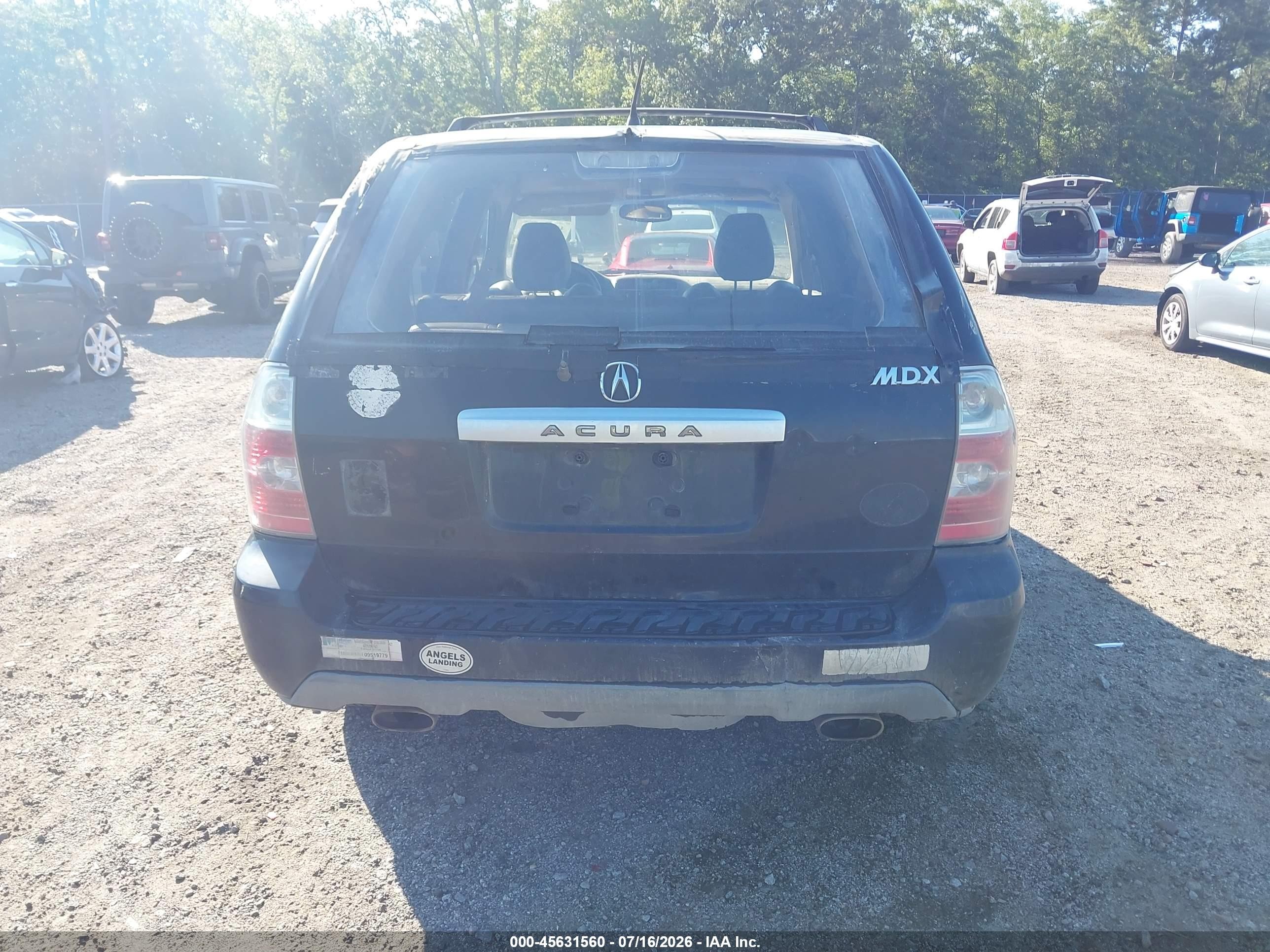 2004 Acura Mdx   Black vin: 2HNYD18634H513633