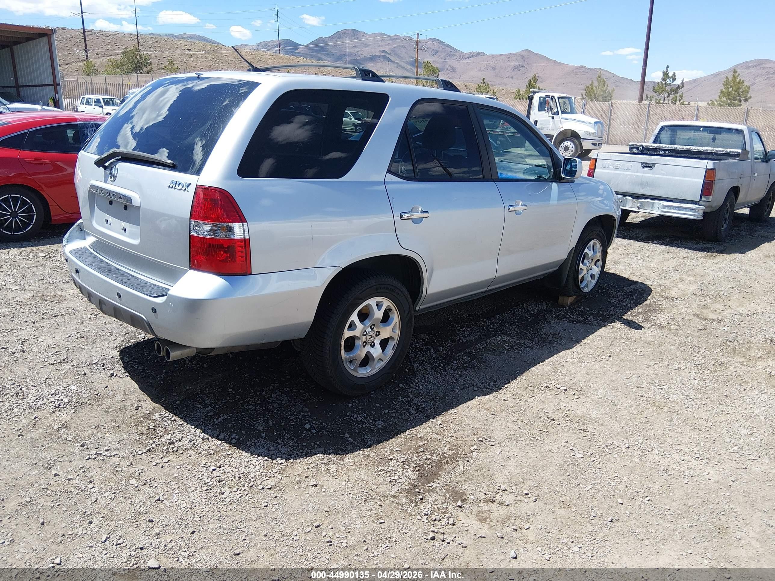 2002 Acura Mdx   Silver vin: 2HNYD18652H525795