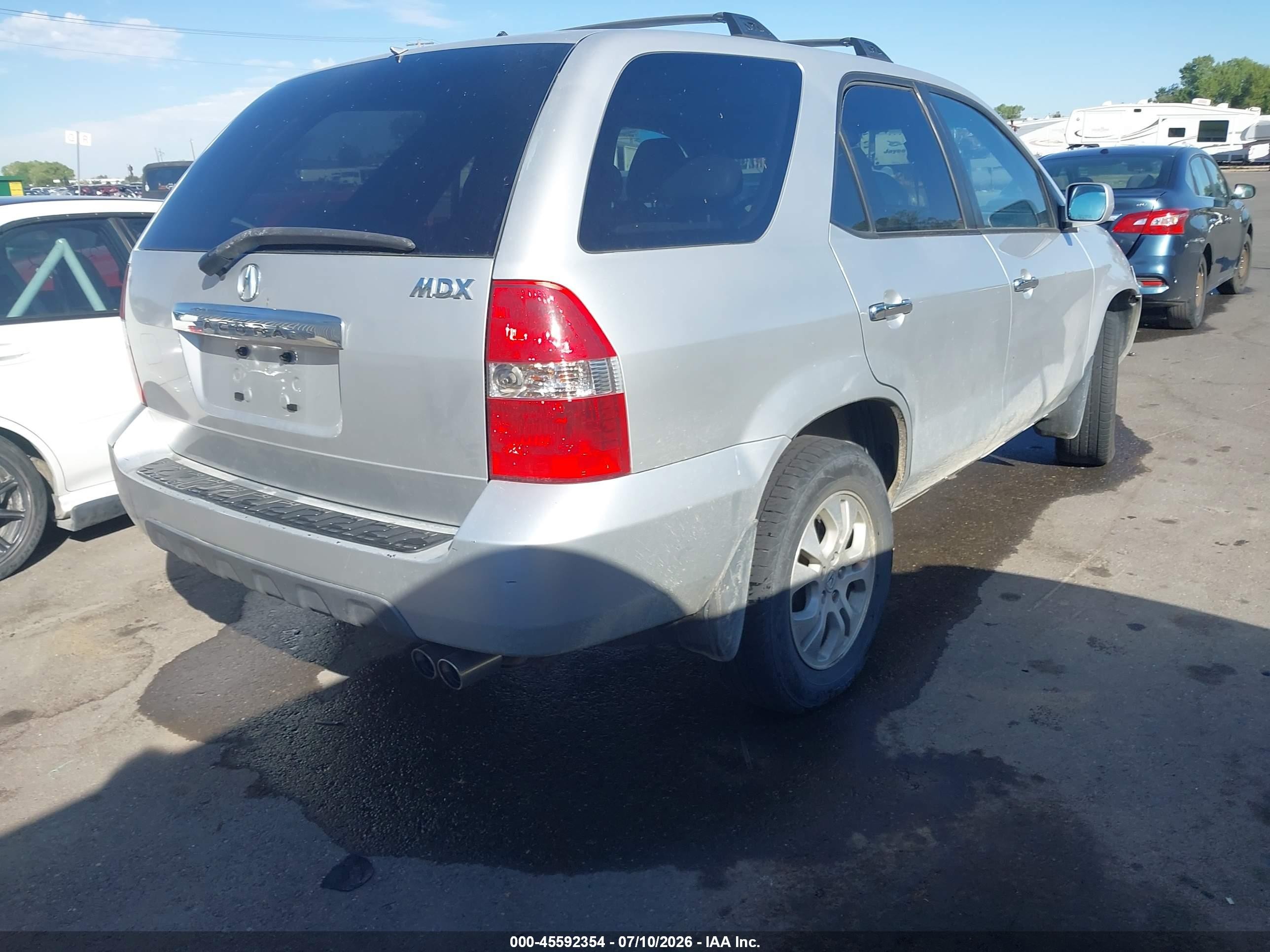 2003 Acura Mdx   Silver vin: 2HNYD18683H528949