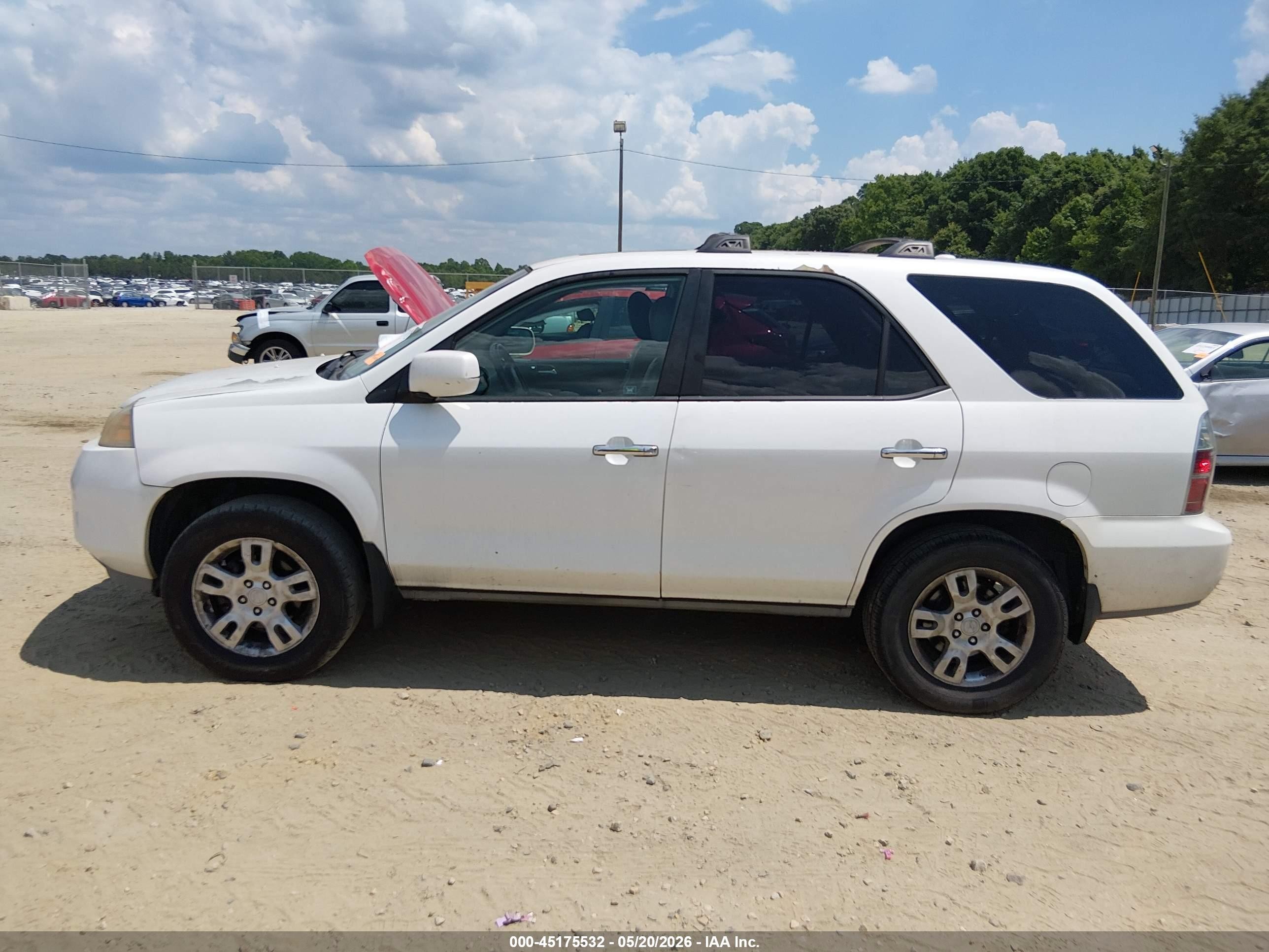 2006 Acura Mdx   White vin: 2HNYD18686H532472