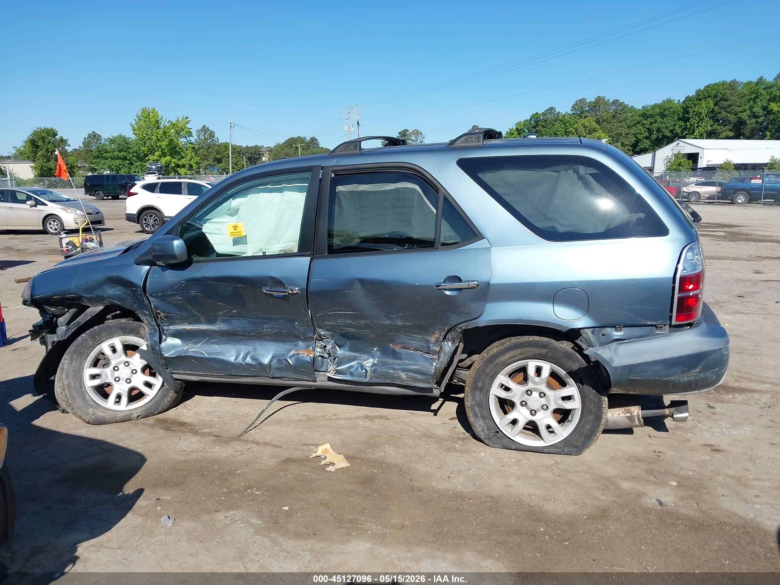2006 Acura Mdx   Blue vin: 2HNYD18726H510234