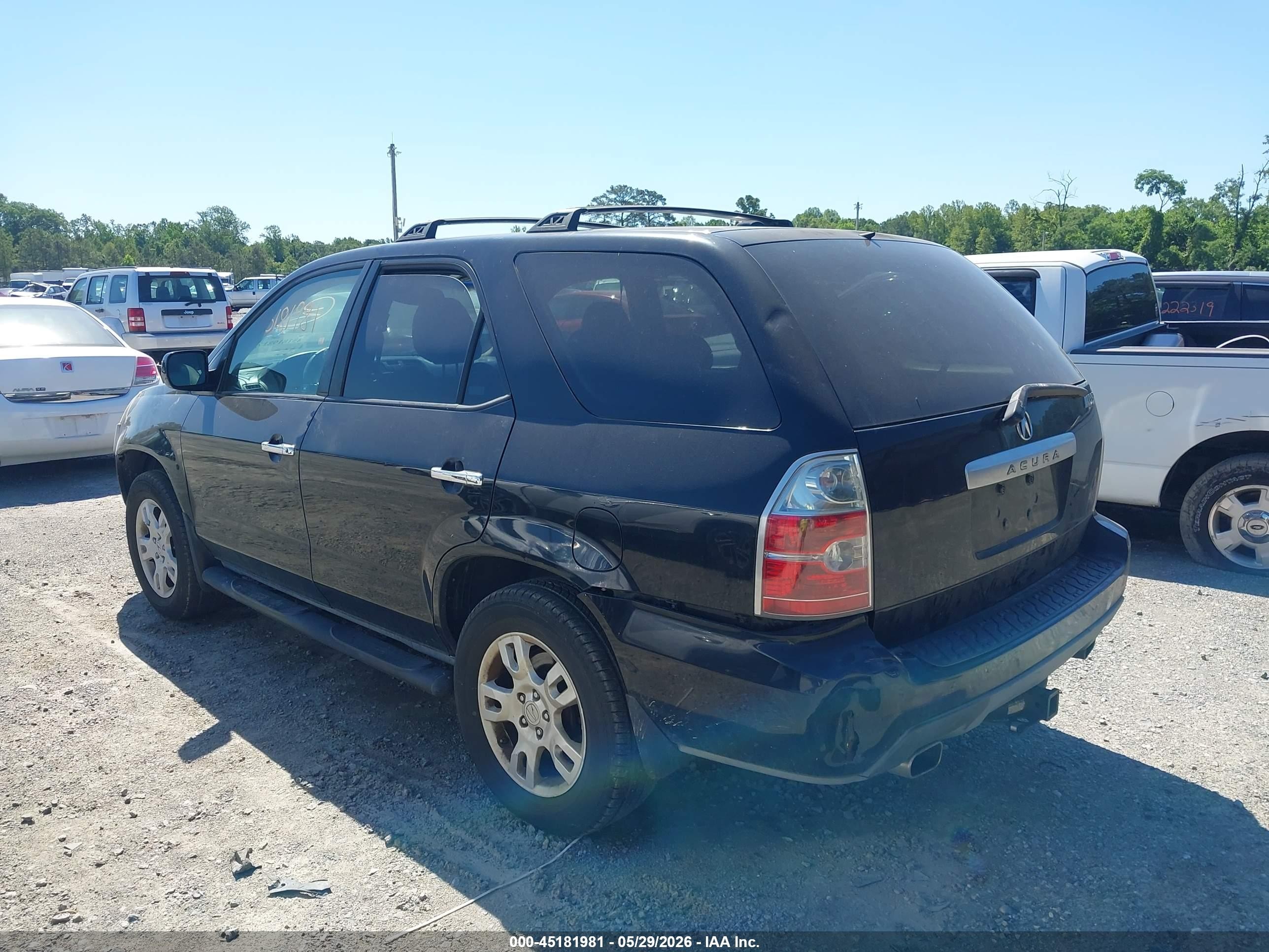 2006 Acura Mdx   Black vin: 2HNYD18756H533376
