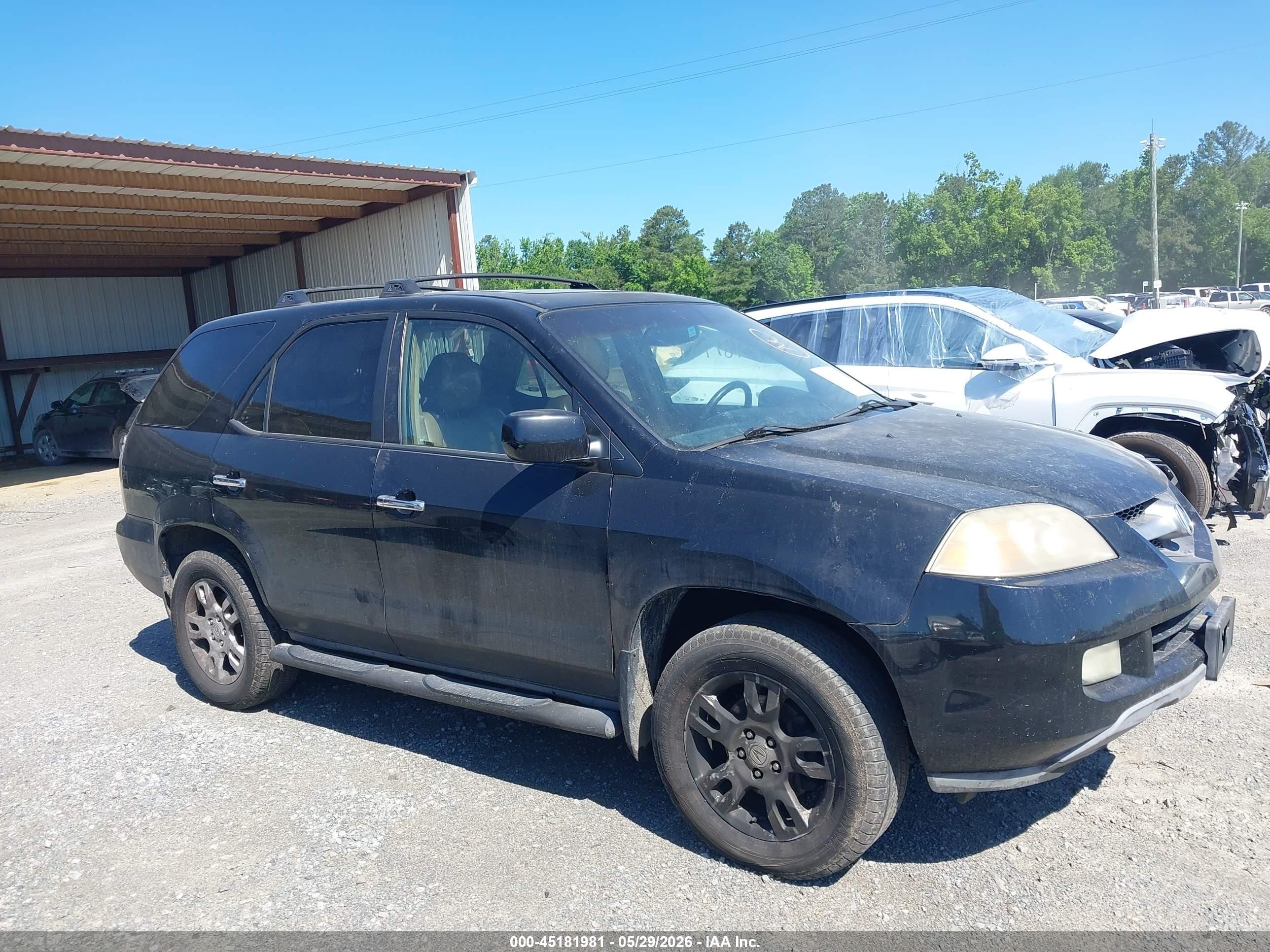 2006 Acura Mdx   Black vin: 2HNYD18756H533376
