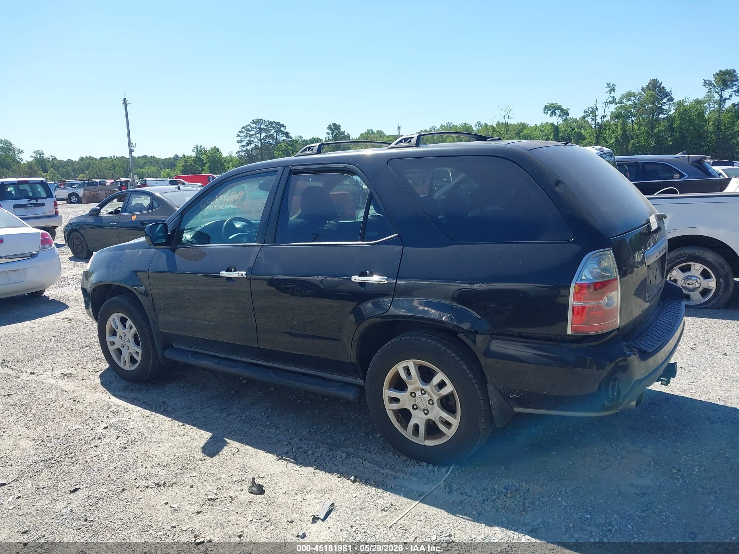 2006 Acura Mdx   Black vin: 2HNYD18756H533376