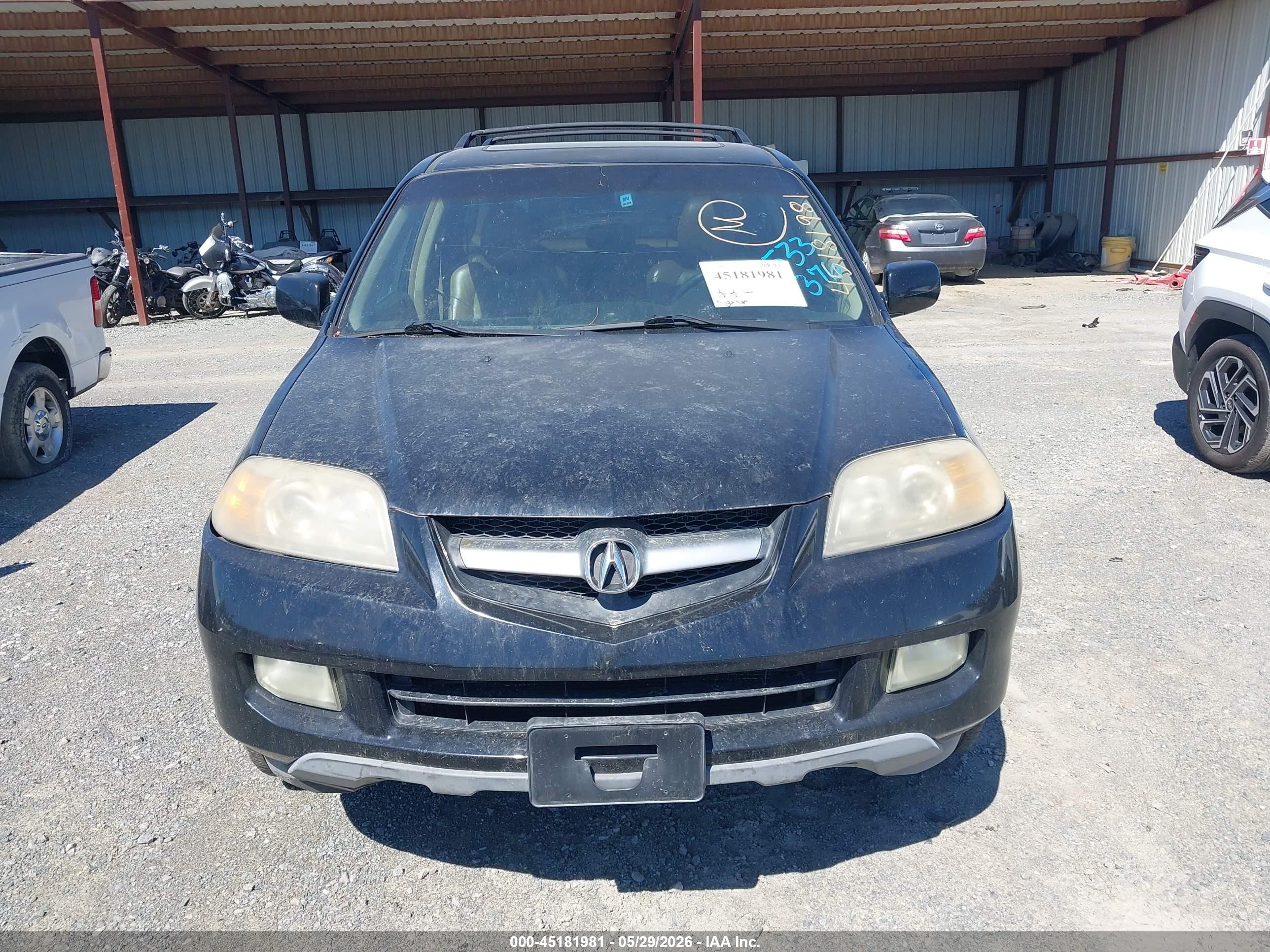 2006 Acura Mdx   Black vin: 2HNYD18756H533376