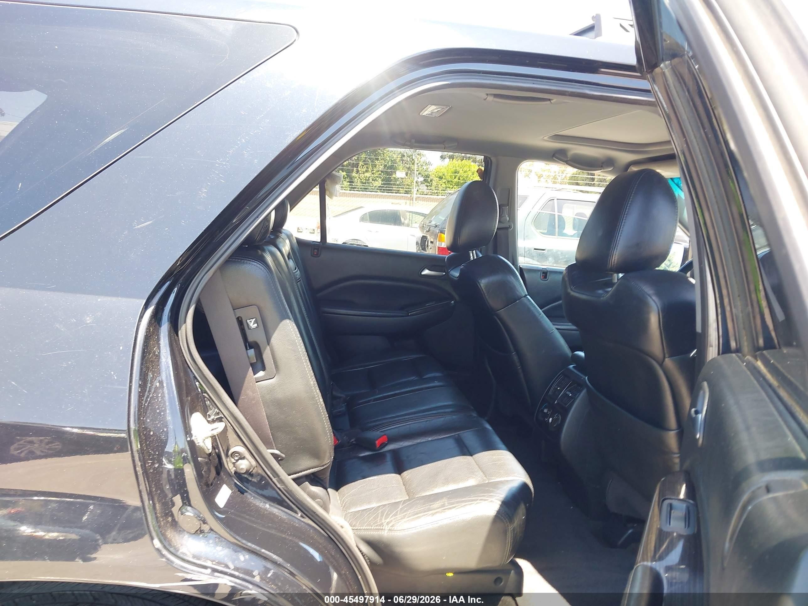 2006 Acura Mdx   Black vin: 2HNYD18886H512871