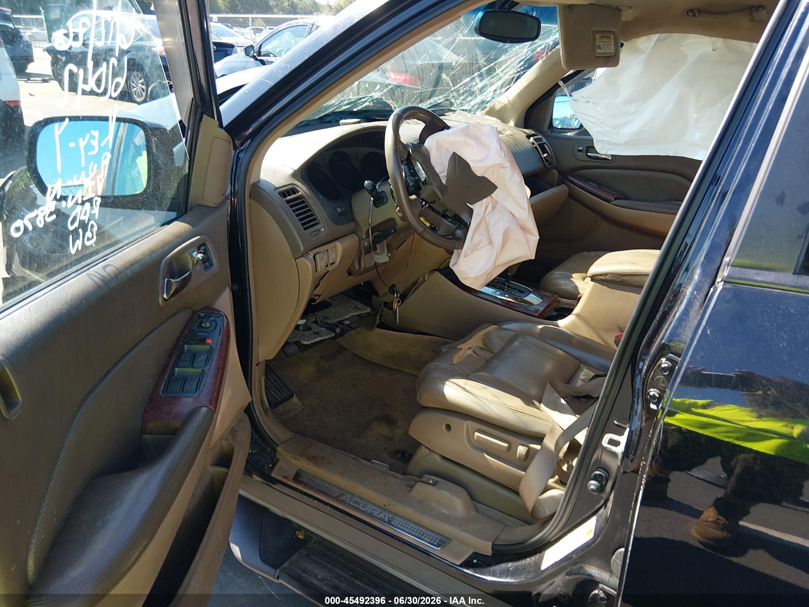 2005 Acura Mdx   Black vin: 2HNYD18905H515870