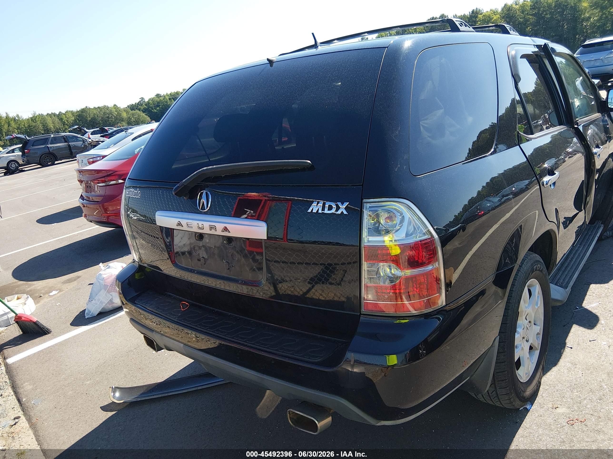 2005 Acura Mdx   Black vin: 2HNYD18905H515870