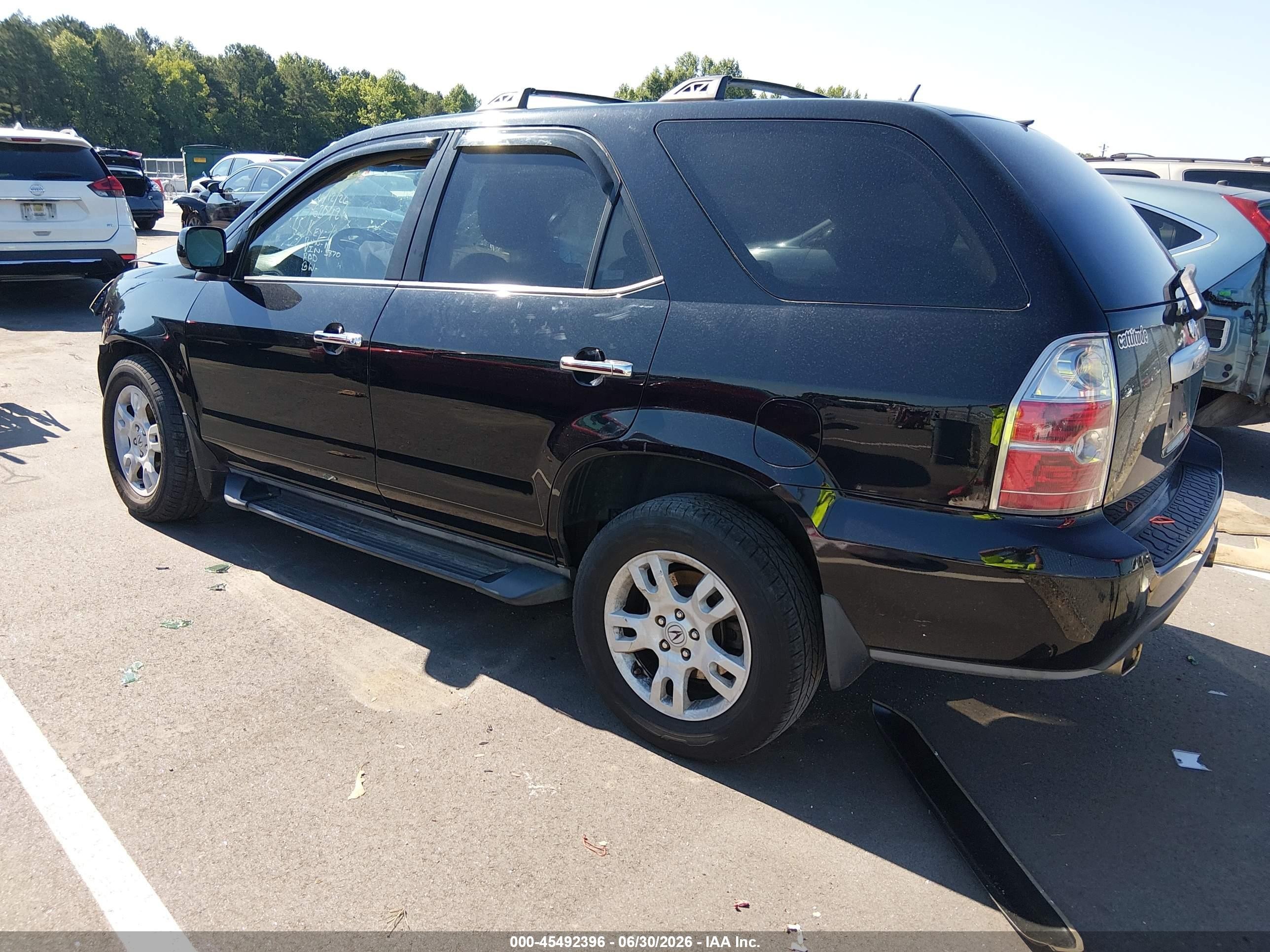 2005 Acura Mdx   Black vin: 2HNYD18905H515870