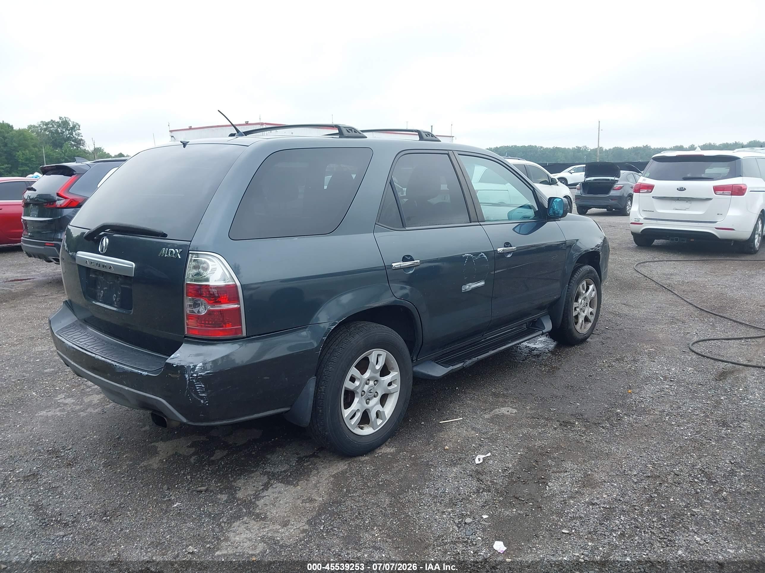 2004 Acura Mdx   Blue vin: 2HNYD18944H543962