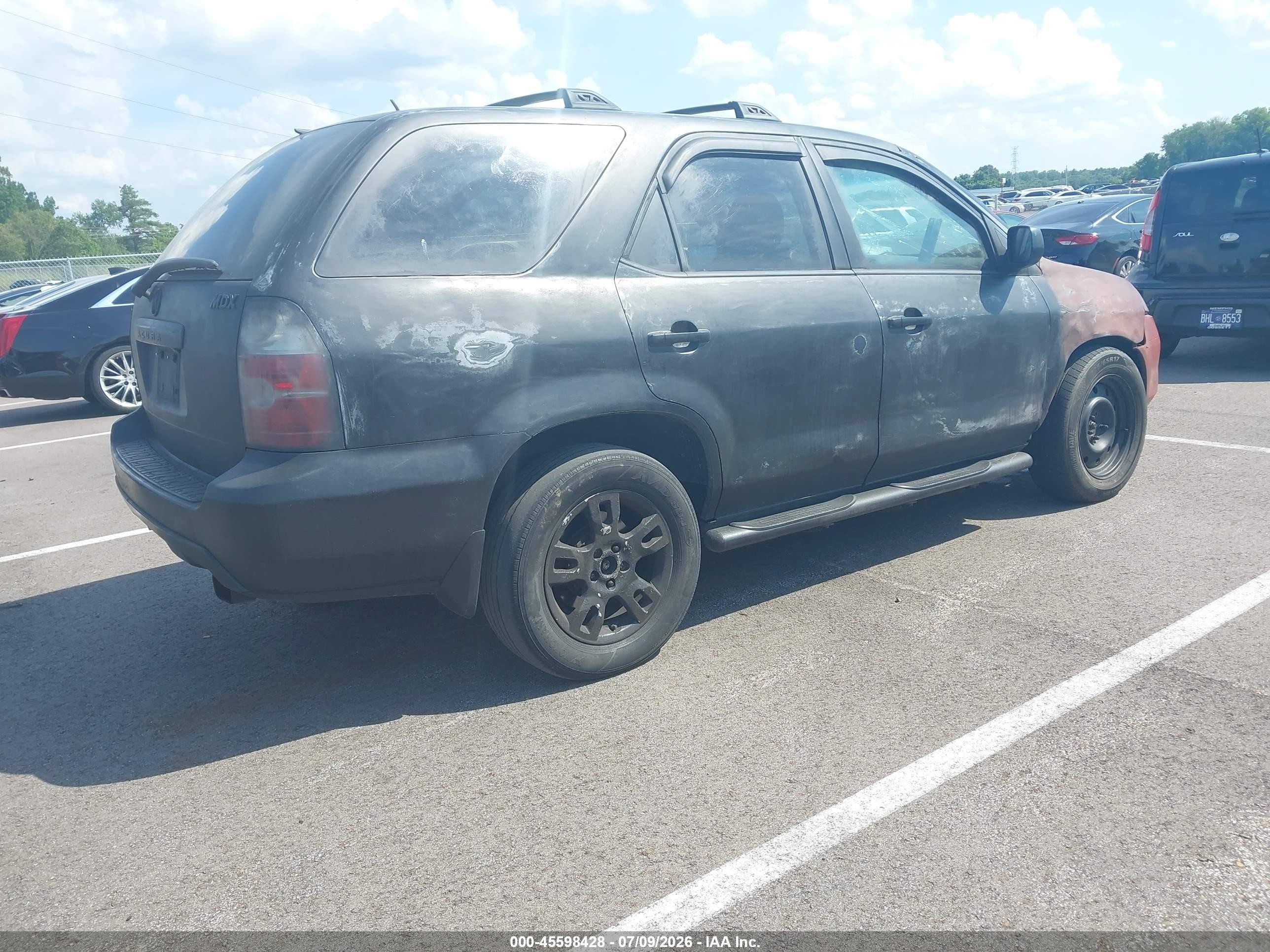 2005 Acura Mdx   Black vin: 2HNYD18985H508309