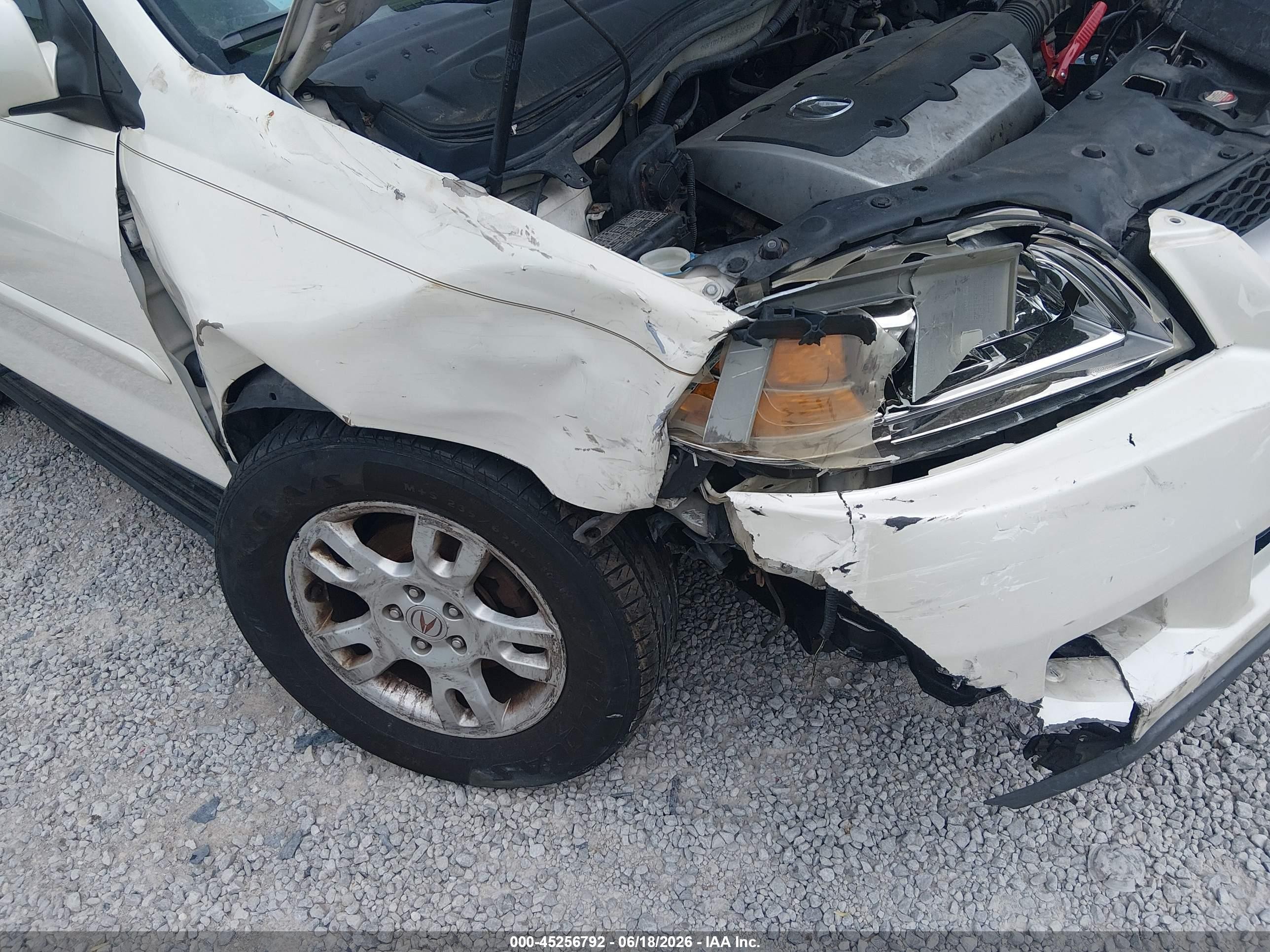 2005 Acura Mdx   White vin: 2HNYD18985H518368