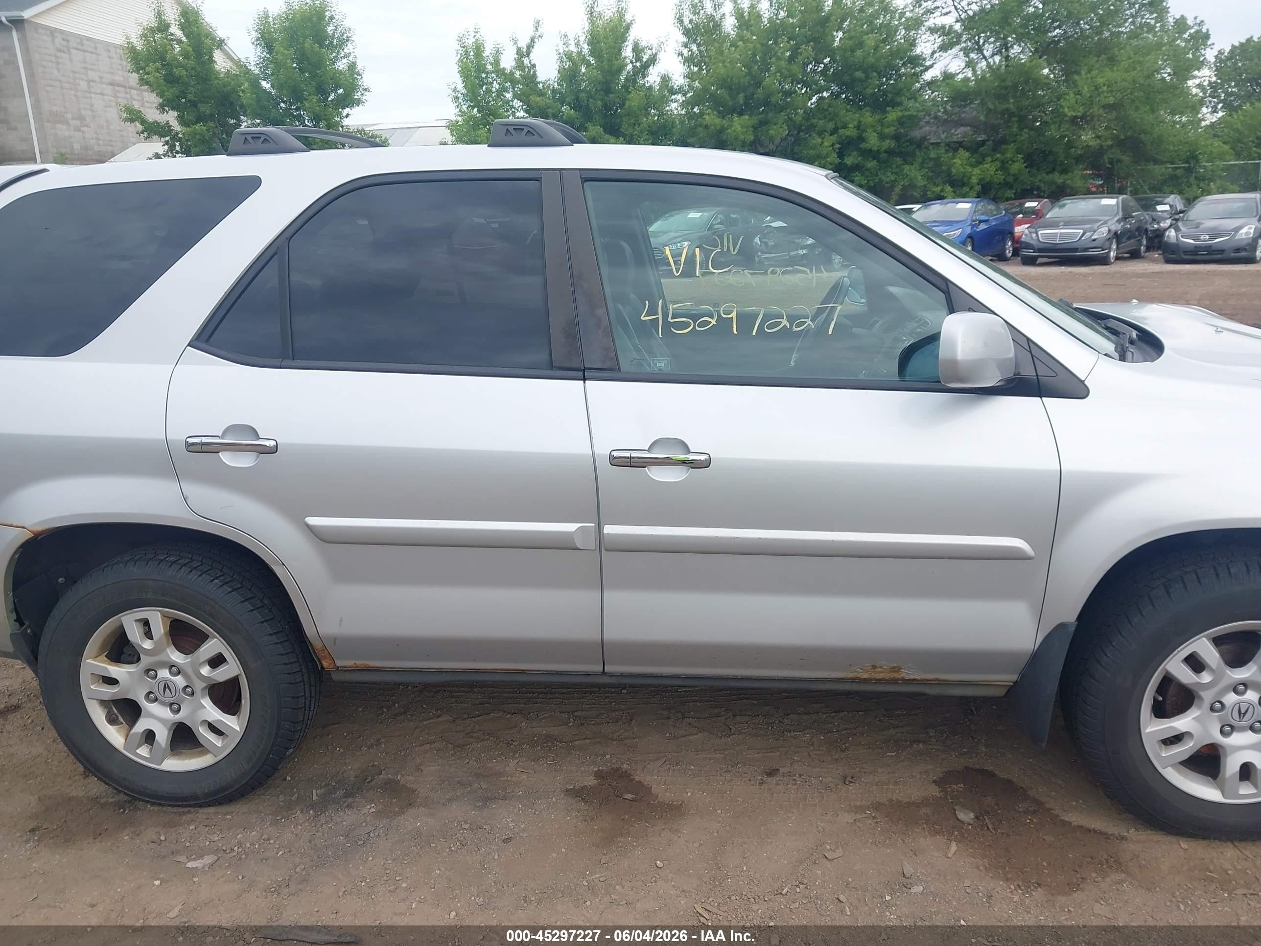 2006 Acura Mdx   Silver vin: 2HNYD18986H503063