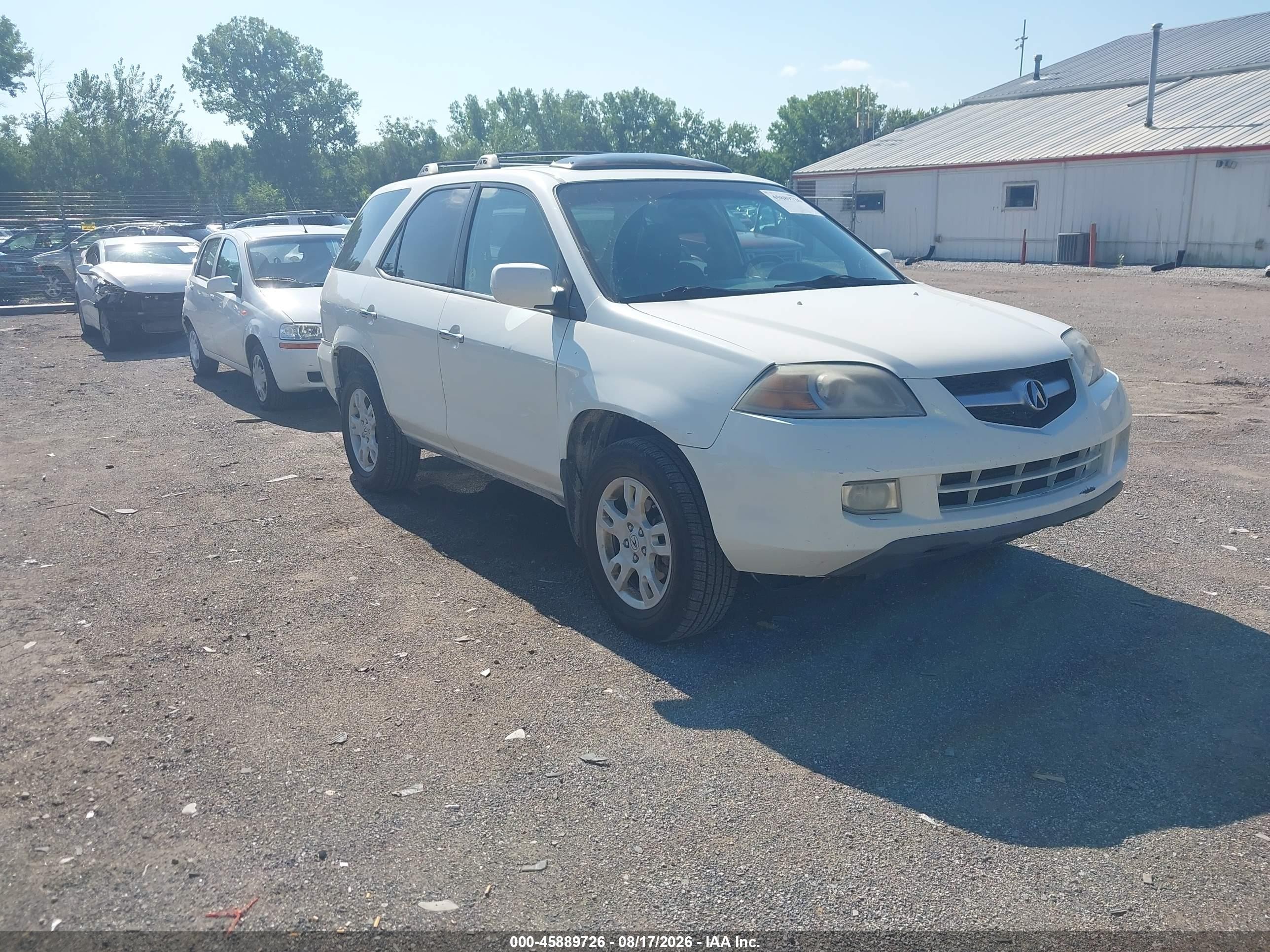 2006 Acura Mdx   White vin: 2HNYD18986H537407