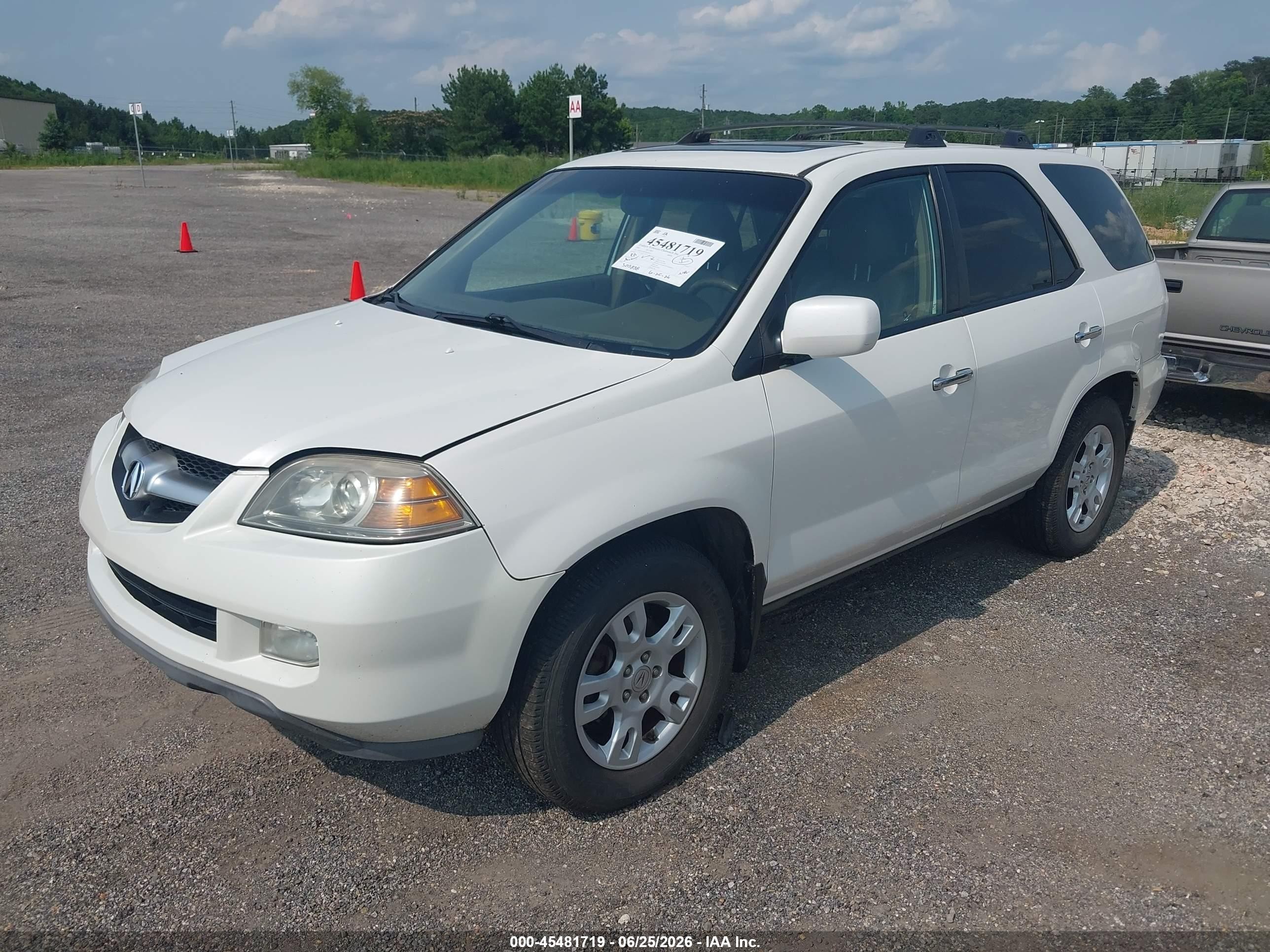 2005 Acura Mdx   White vin: 2HNYD18995H506925