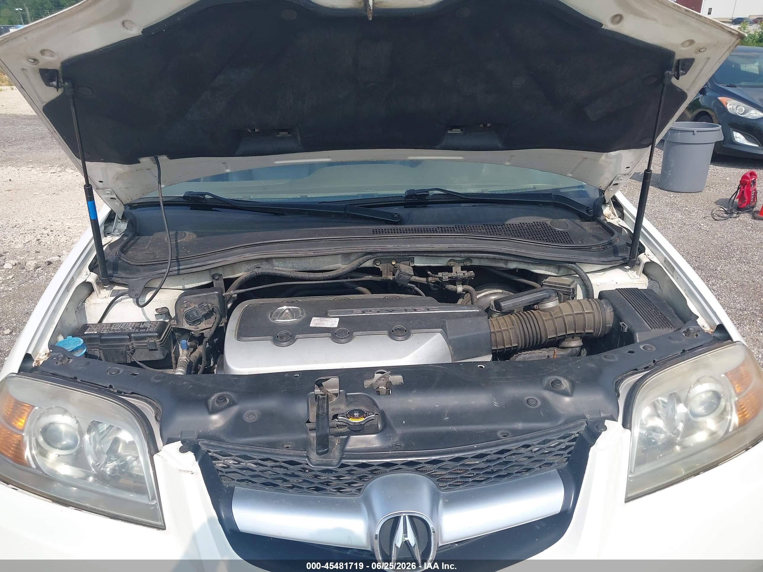2005 Acura Mdx   White vin: 2HNYD18995H506925