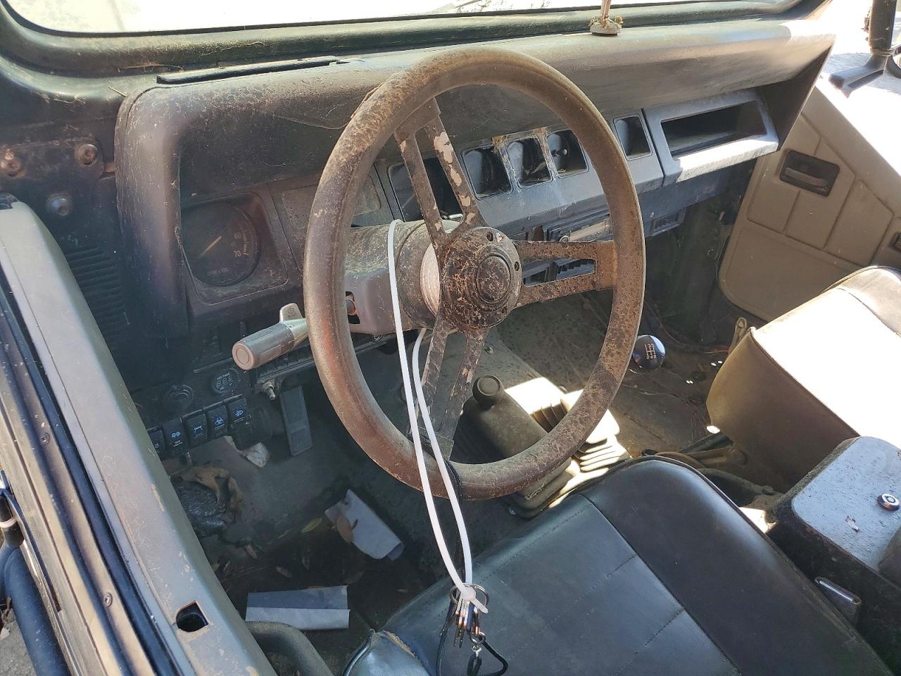 1989 Jeep Wrangler / Yj Laredo Black vin: 2J4FY59T2KJ142185