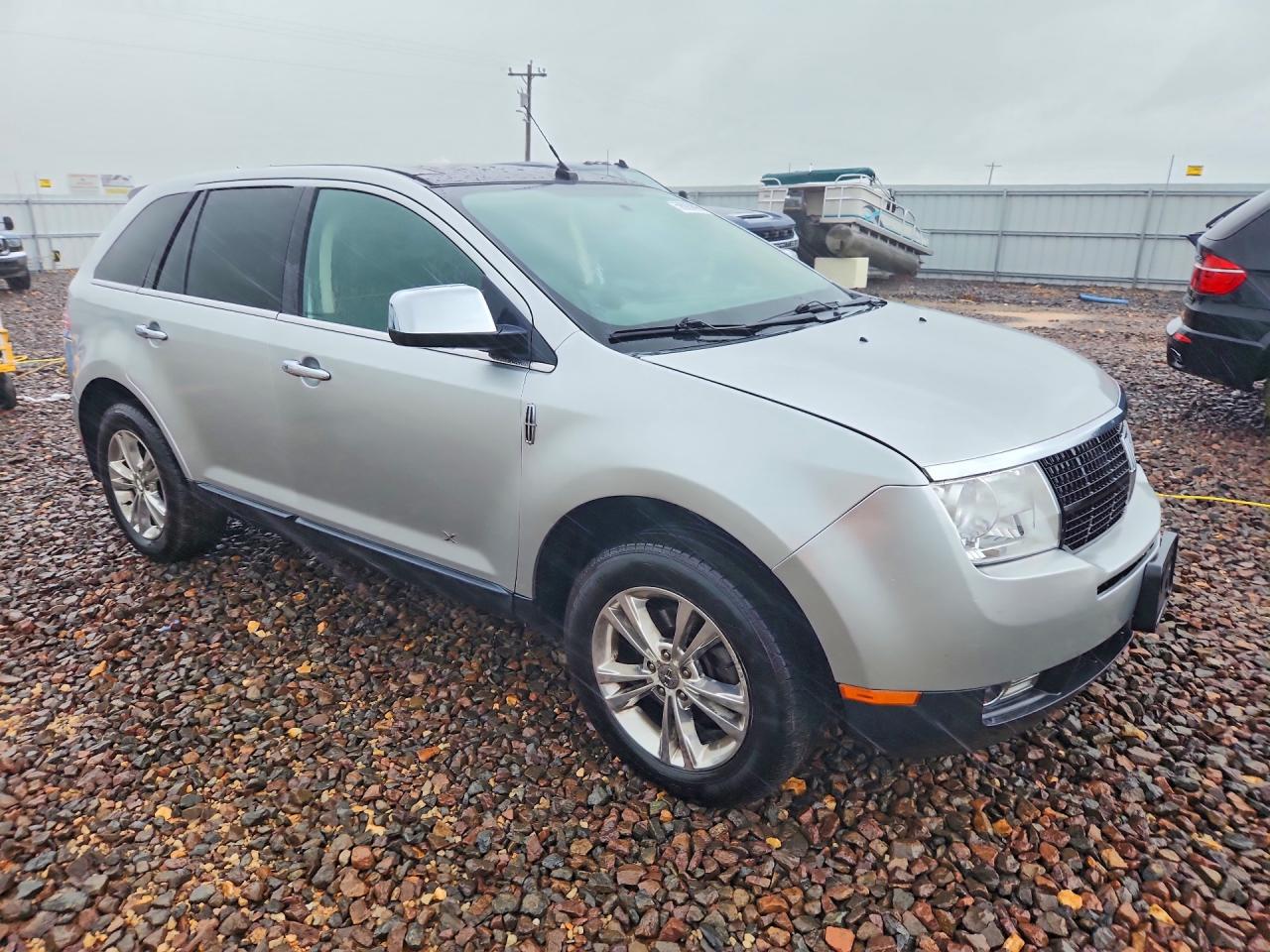2010 Lincoln Mks 4d 2wd Silver vin: 2LMDJ8JC9ABJ19073