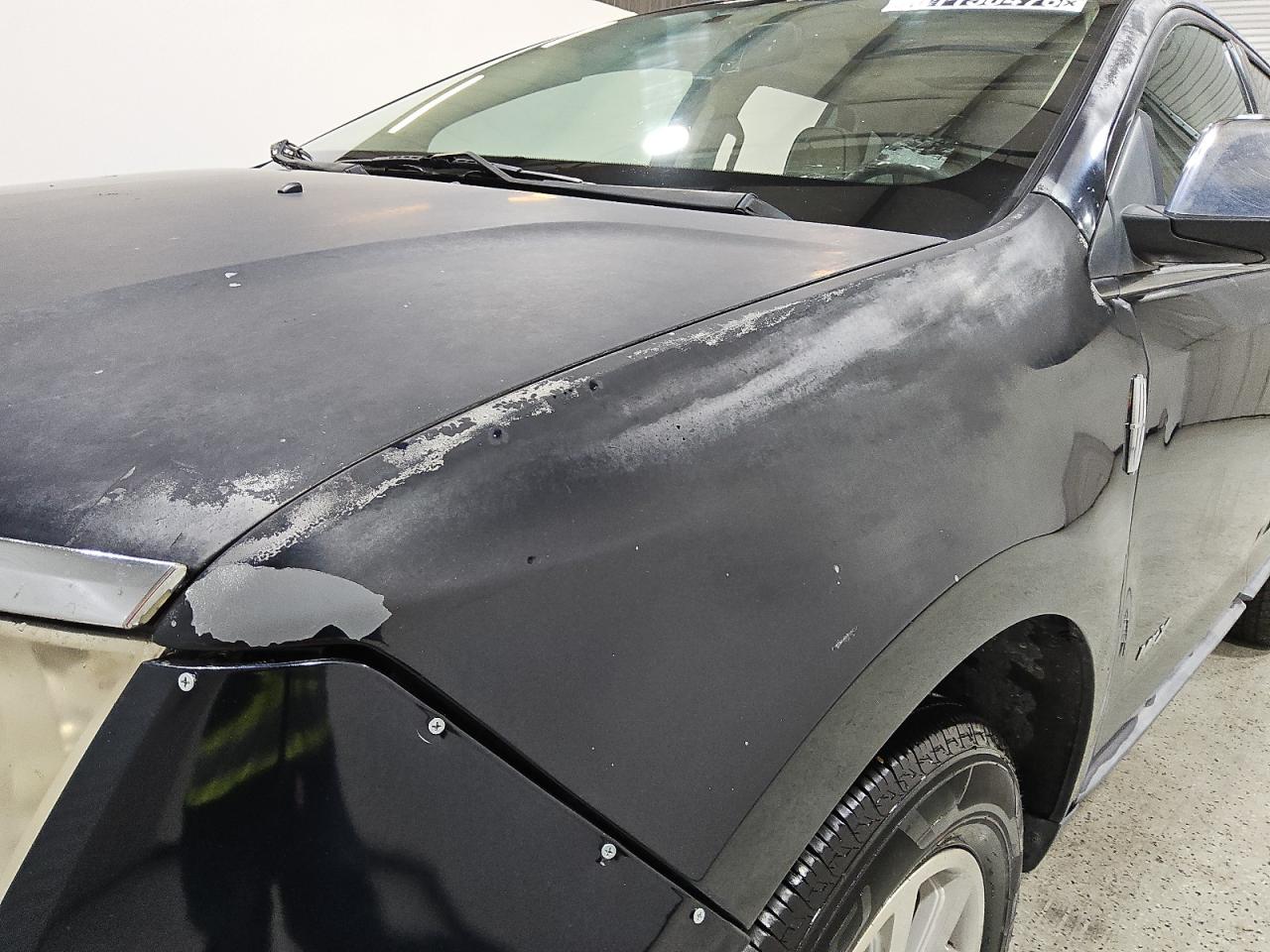 2008 Lincoln Mkx Black vin: 2LMDU68C48BJ27089 Damage: Left Front Fender, Peeling, 5 To 6 Inches