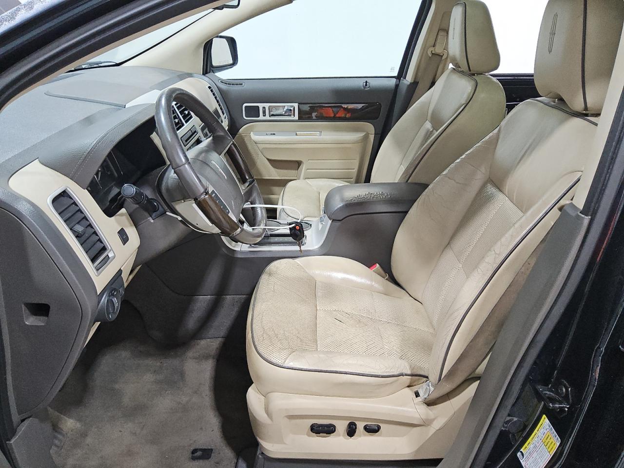 2008 Lincoln Mkx Black vin: 2LMDU68C48BJ27089 Damage: Left Front Seat, Torn, 1 To 2 Inches