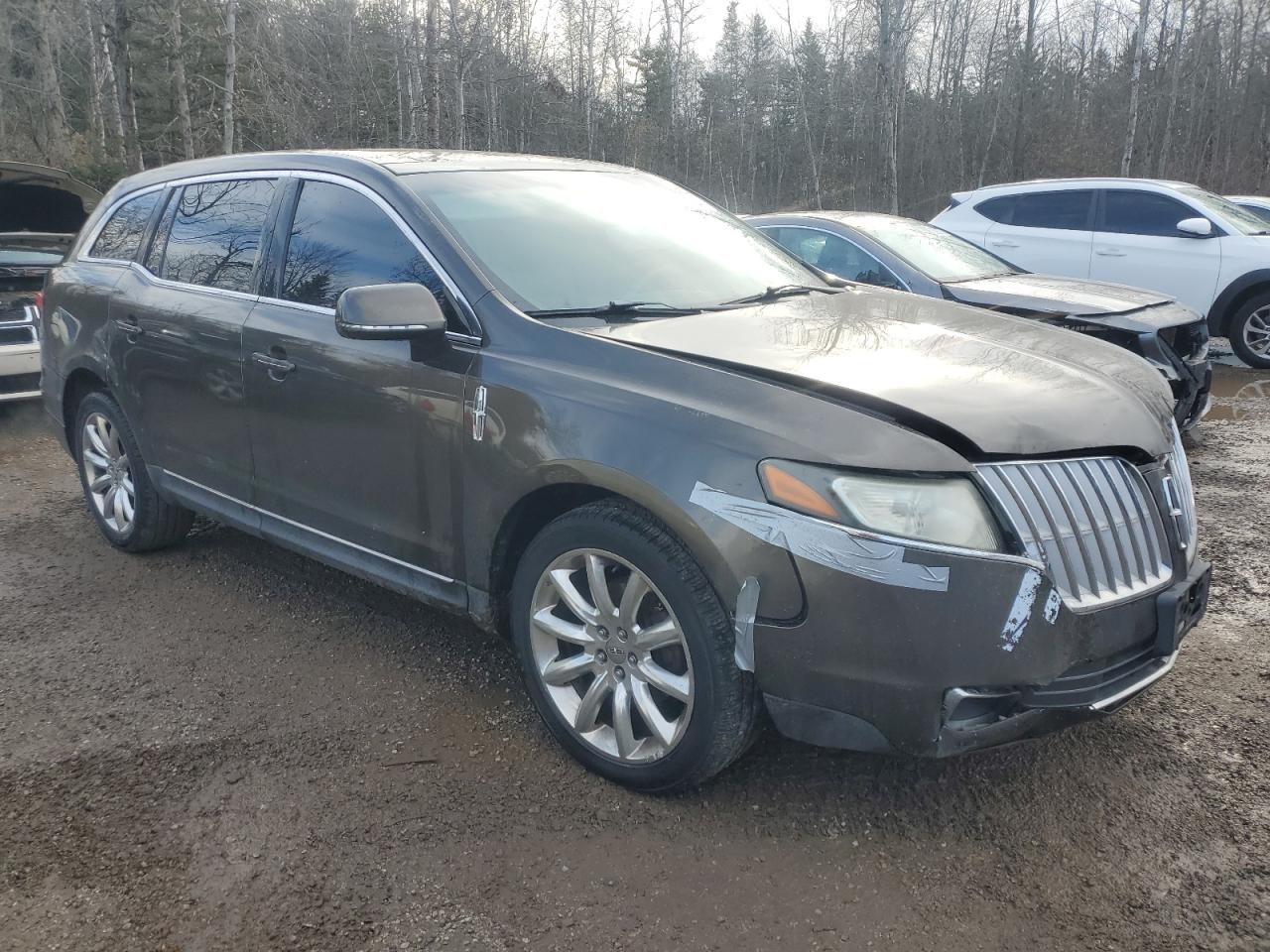 2011 Lincoln Mkt Brown vin: 2LMHJ5AR9BBJ52046