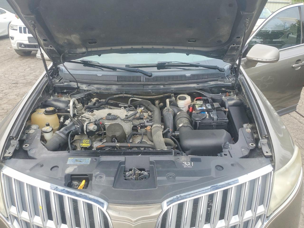 2012 Lincoln Mkt Tan vin: 2LMHJ5AT8CBL53224