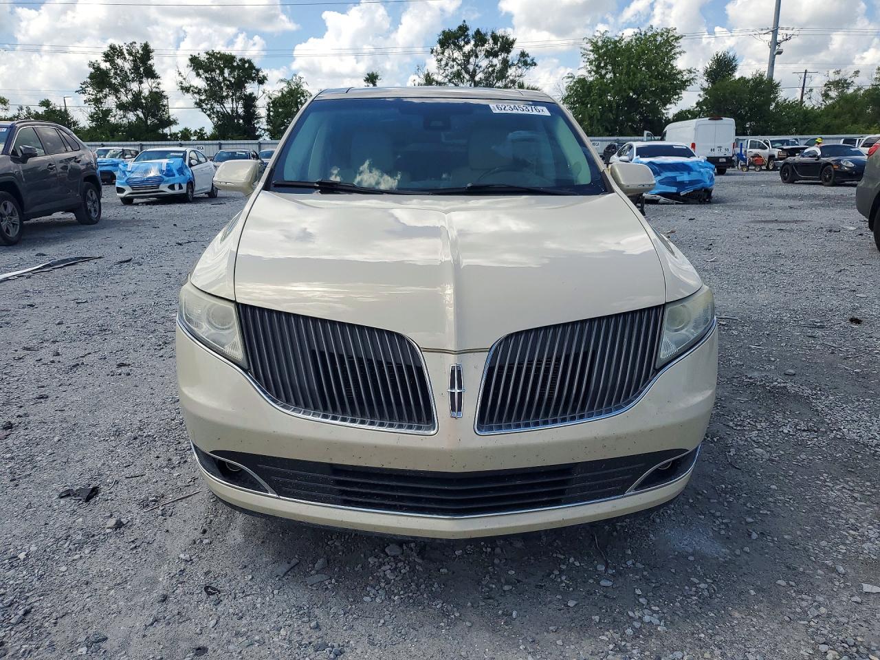 2014 Lincoln Mkt Cream vin: 2LMHJ5ATXEBL53518