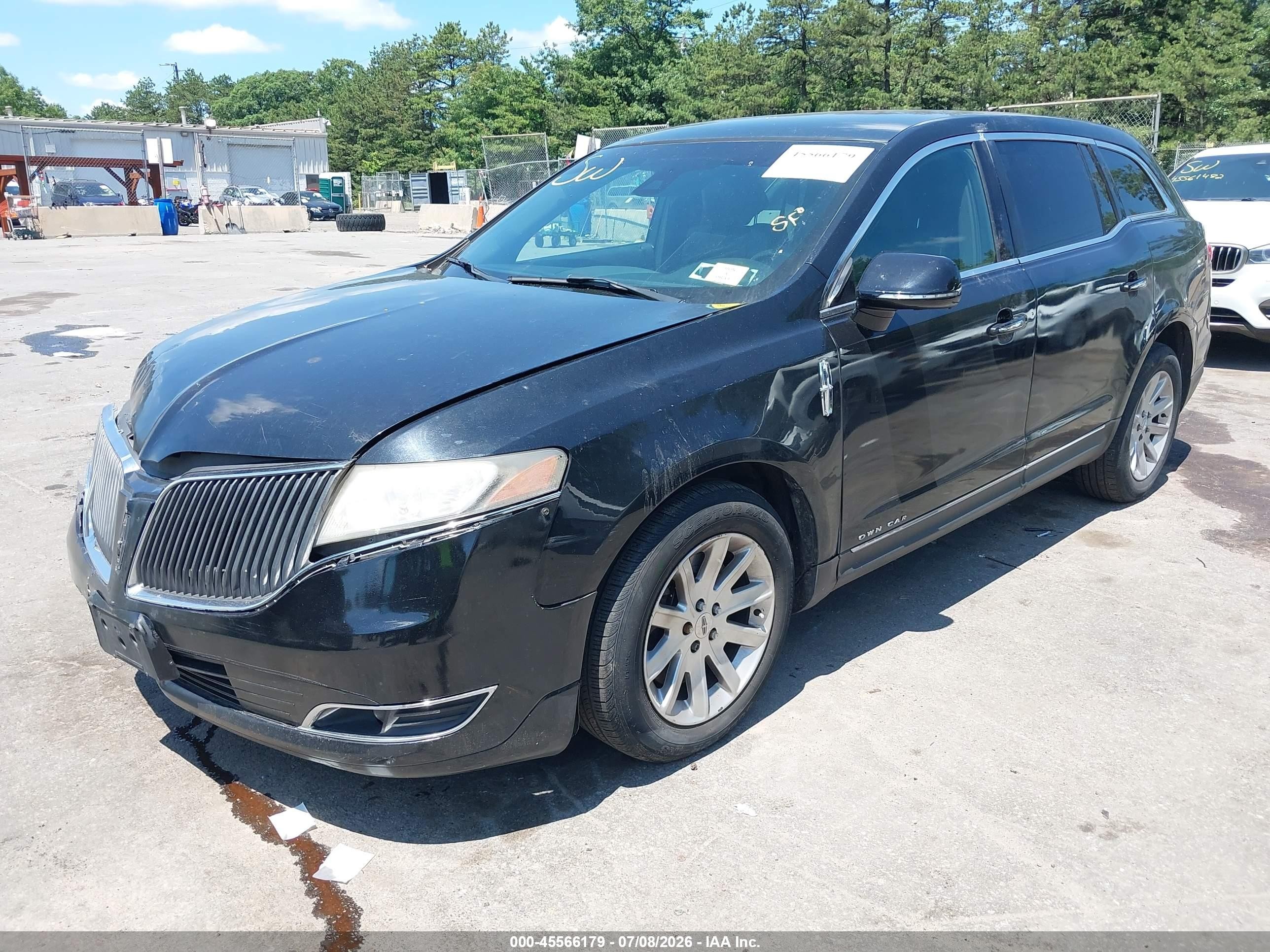 2014 Lincoln Mkt Livery Black vin: 2LMHJ5NK6EBL53100