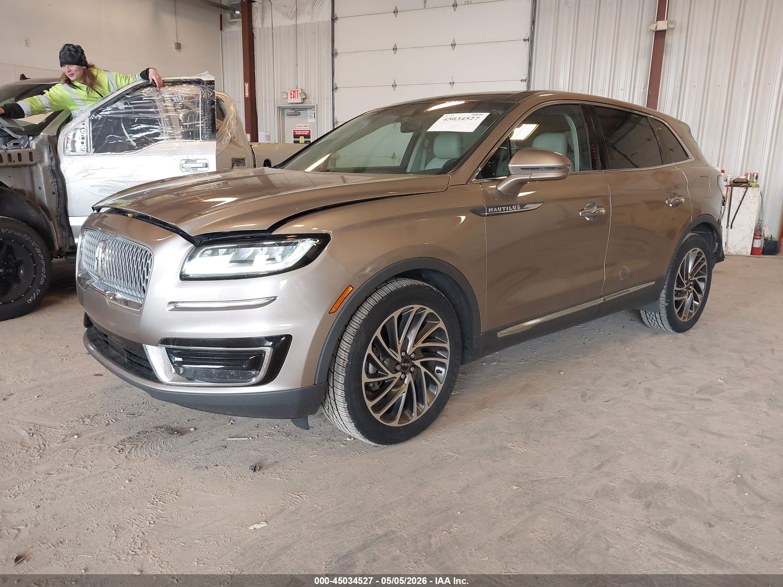 2019 Lincoln Nautilus Reserve Tan vin: 2LMPJ8L94KBL58613