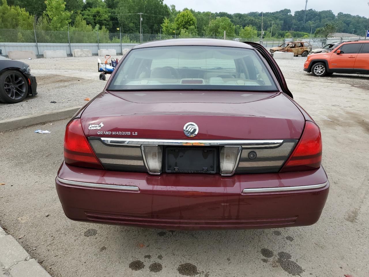 2010 Mercury Grand Marquis Ls Burgundy vin: 2MEBM7FV6AX605554