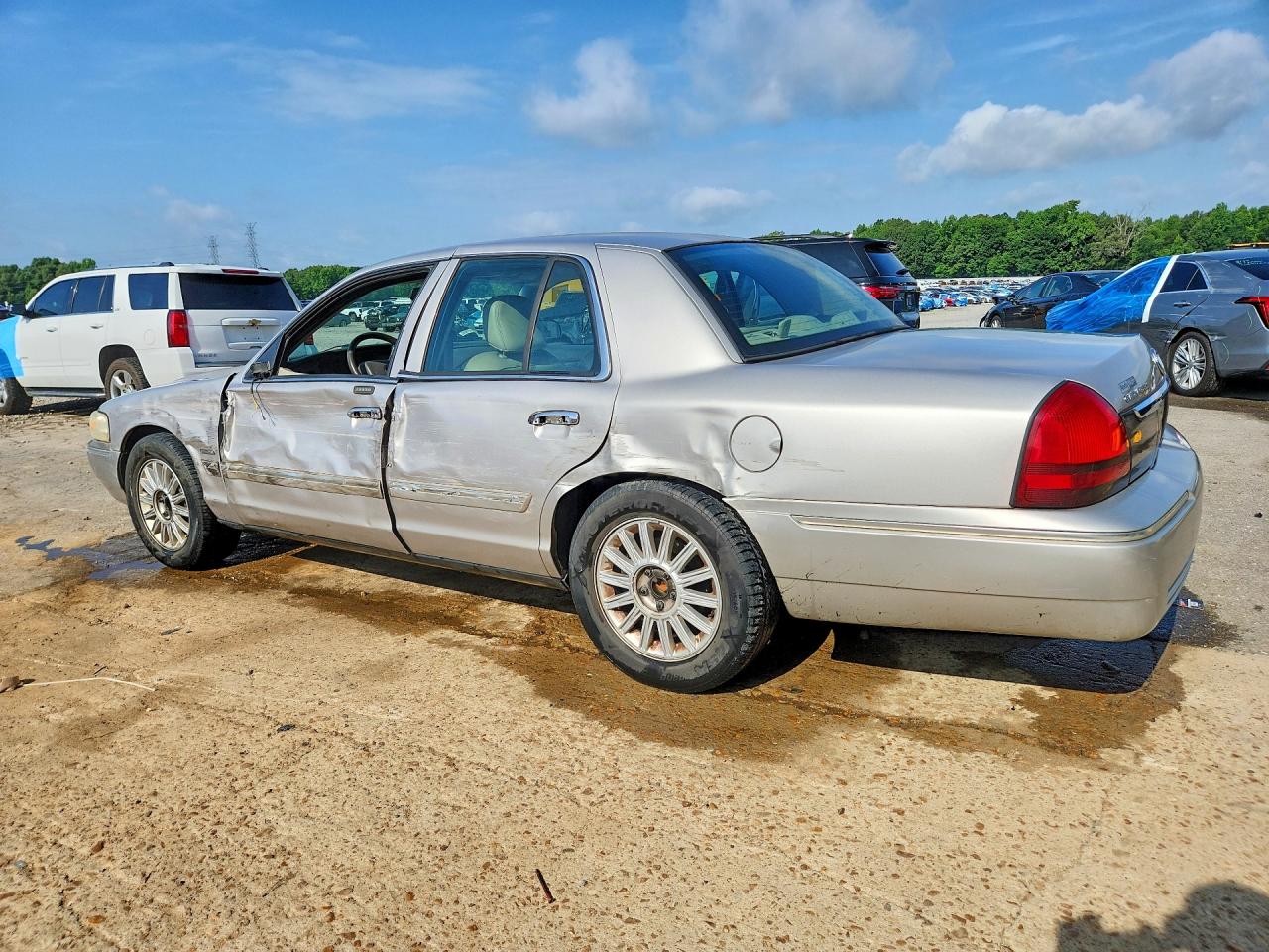 2010 Mercury Grand Marquis Ls Tan vin: 2MEBM7FV9AX609016