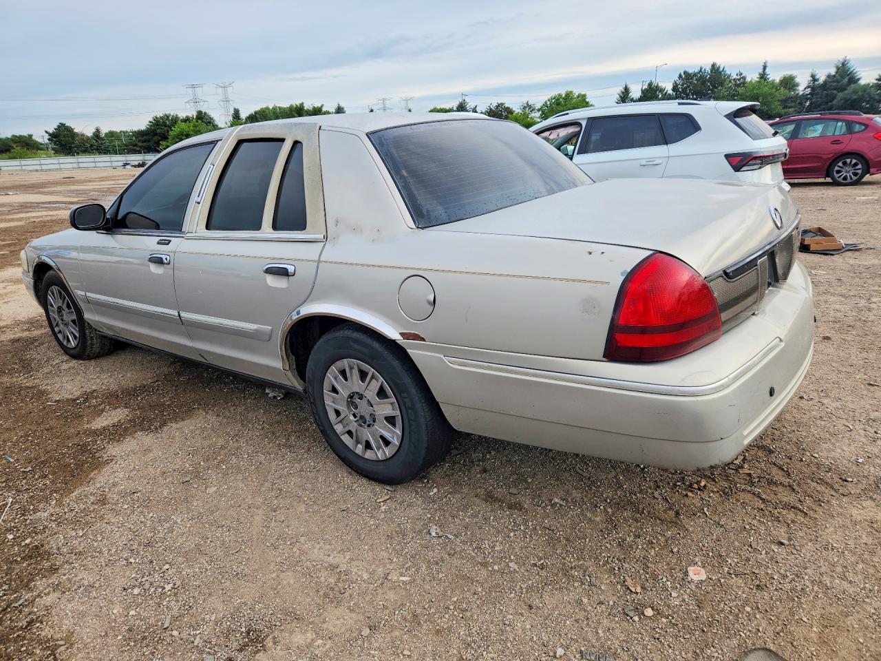 2006 Mercury Grand Marquis Gs Gold vin: 2MEFM74V26X609225