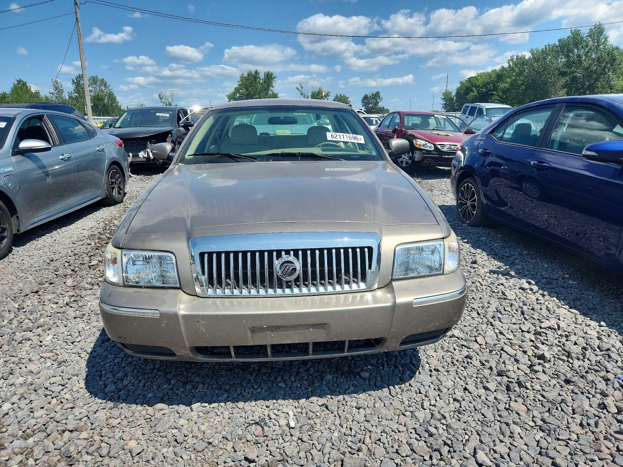 2006 Mercury Grand Marquis Gs Tan vin: 2MEFM74V56X652277
