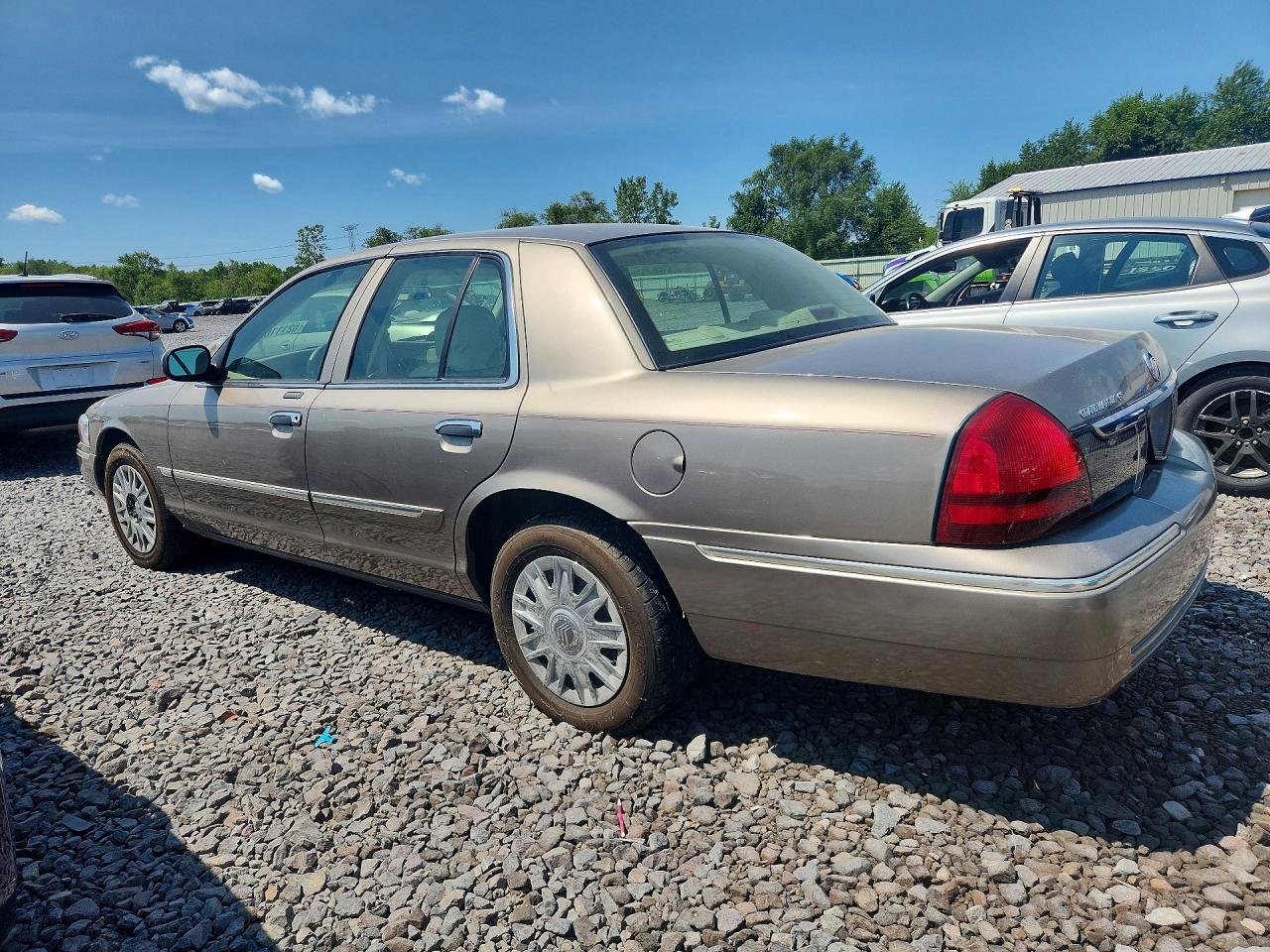 2006 Mercury Grand Marquis Gs Tan vin: 2MEFM74V56X652277