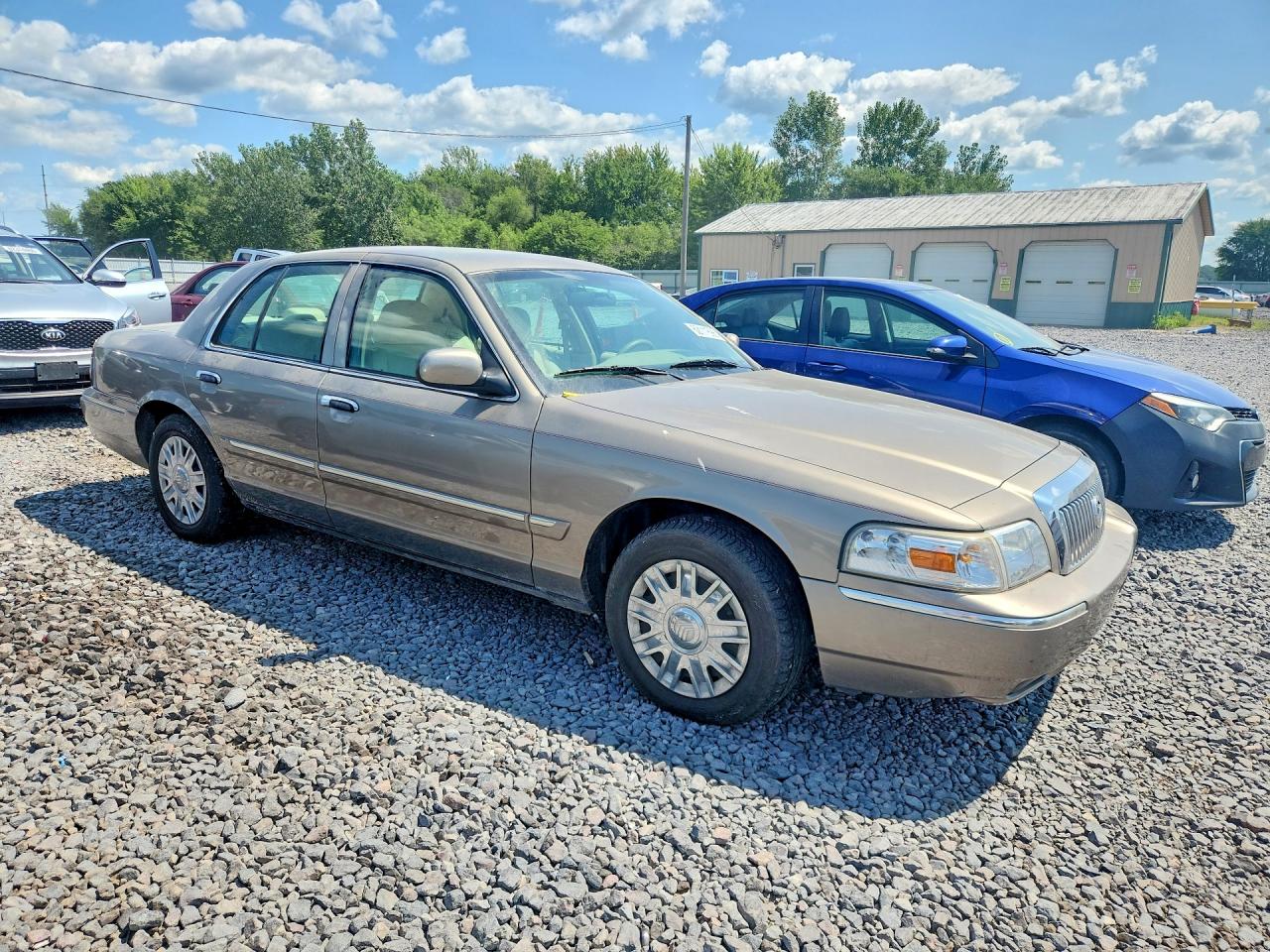 2006 Mercury Grand Marquis Gs Tan vin: 2MEFM74V56X652277
