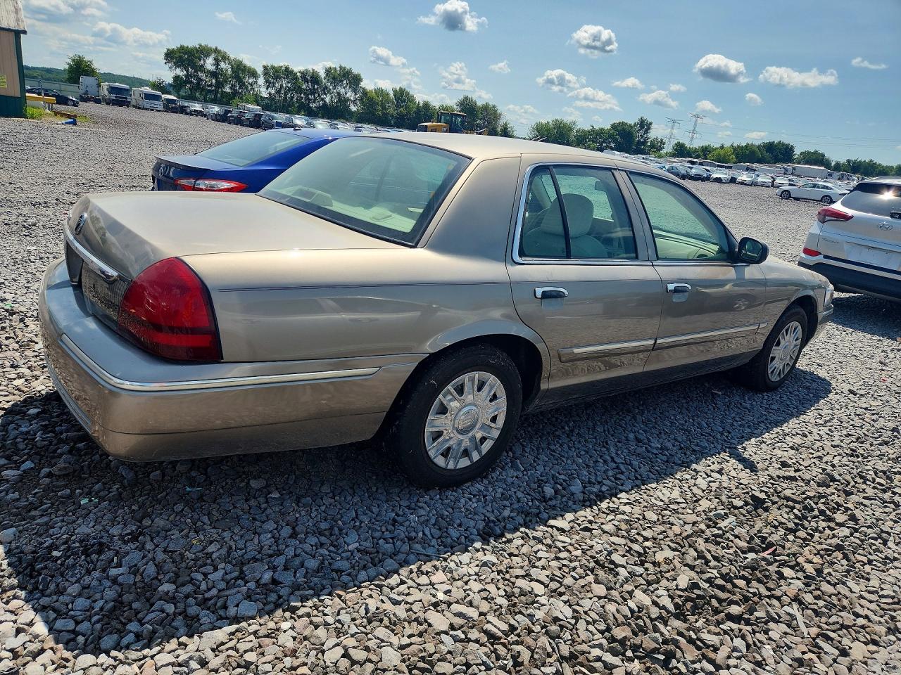 2006 Mercury Grand Marquis Gs Tan vin: 2MEFM74V56X652277