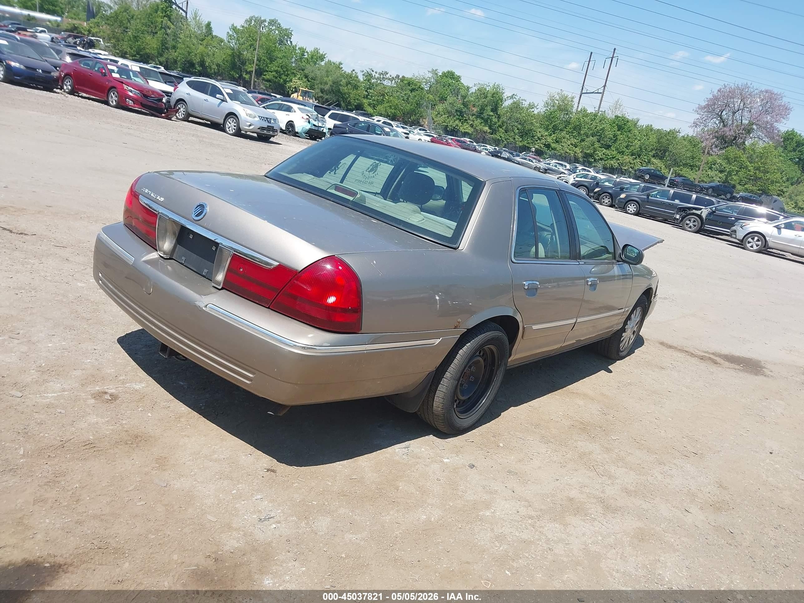 2003 Mercury Grand Marquis Gs Champagne vin: 2MEFM74W03X657083