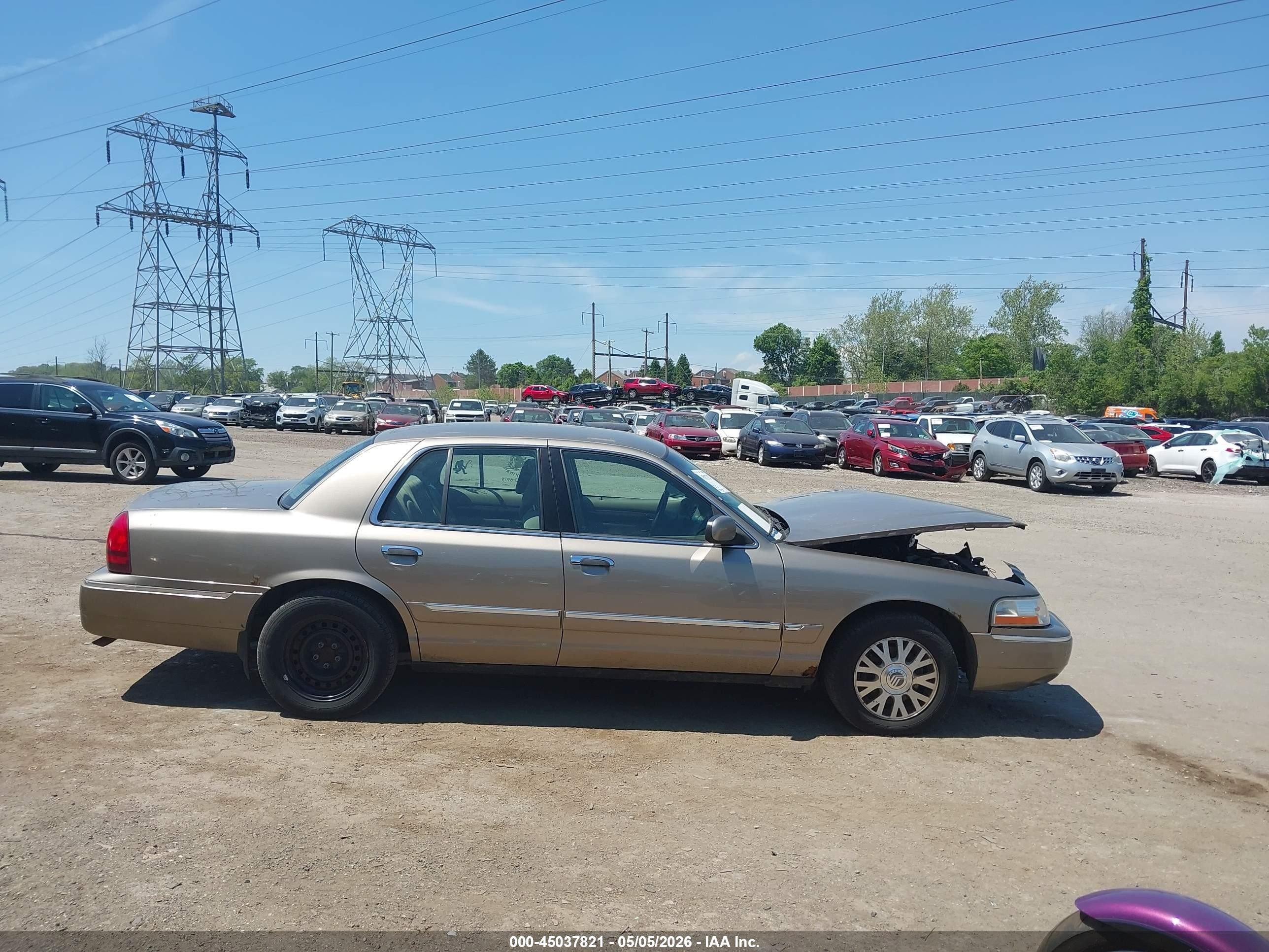 2003 Mercury Grand Marquis Gs Champagne vin: 2MEFM74W03X657083