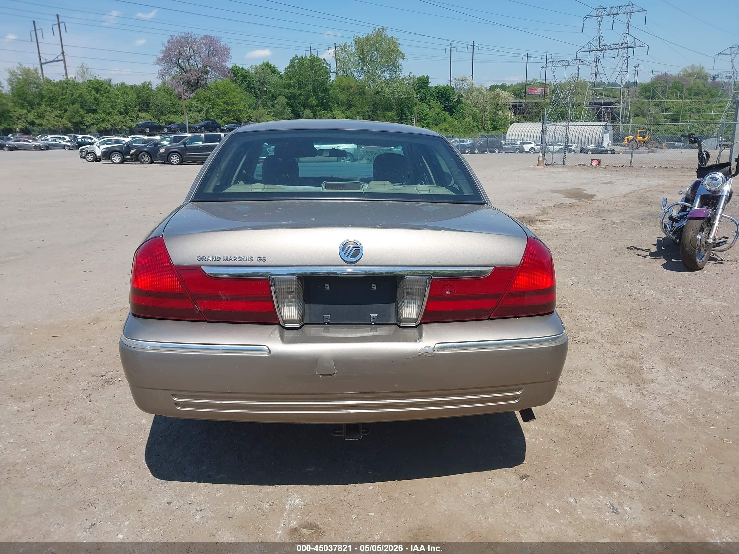 2003 Mercury Grand Marquis Gs Champagne vin: 2MEFM74W03X657083