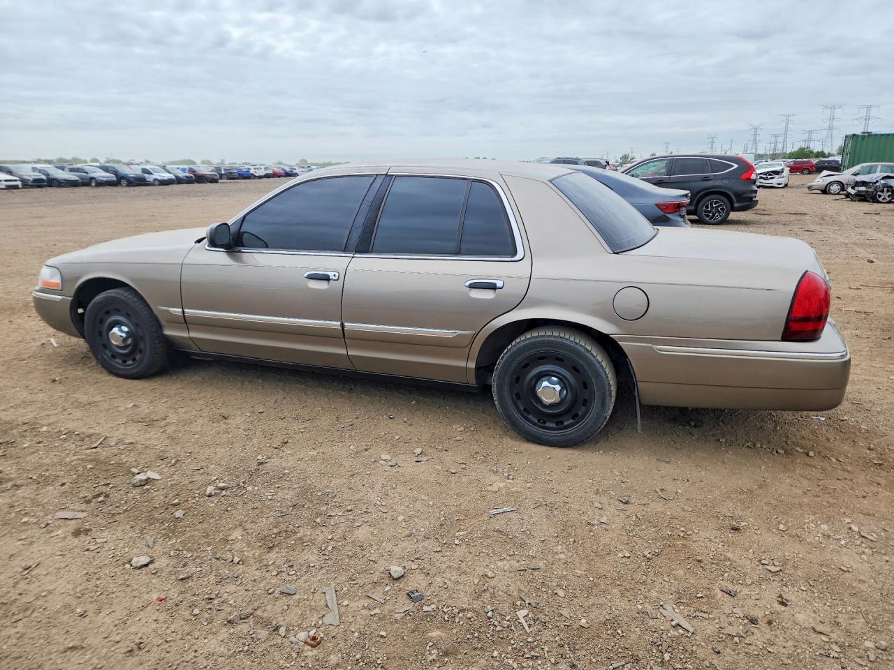 2003 Mercury Grand Marquis Gs Желто-коричневый vin: 2MEFM74W03X660663