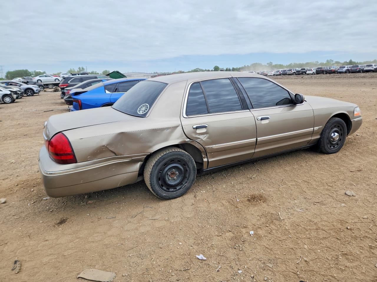 2003 Mercury Grand Marquis Gs Желто-коричневый vin: 2MEFM74W03X660663