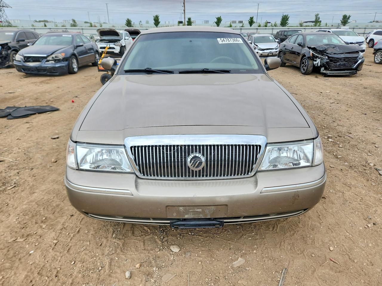 2003 Mercury Grand Marquis Gs Желто-коричневый vin: 2MEFM74W03X660663