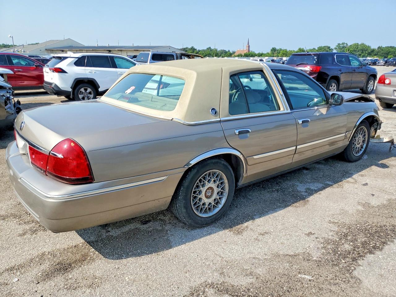 2001 Mercury Grand Marquis Gs Tan vin: 2MEFM74W11X660250