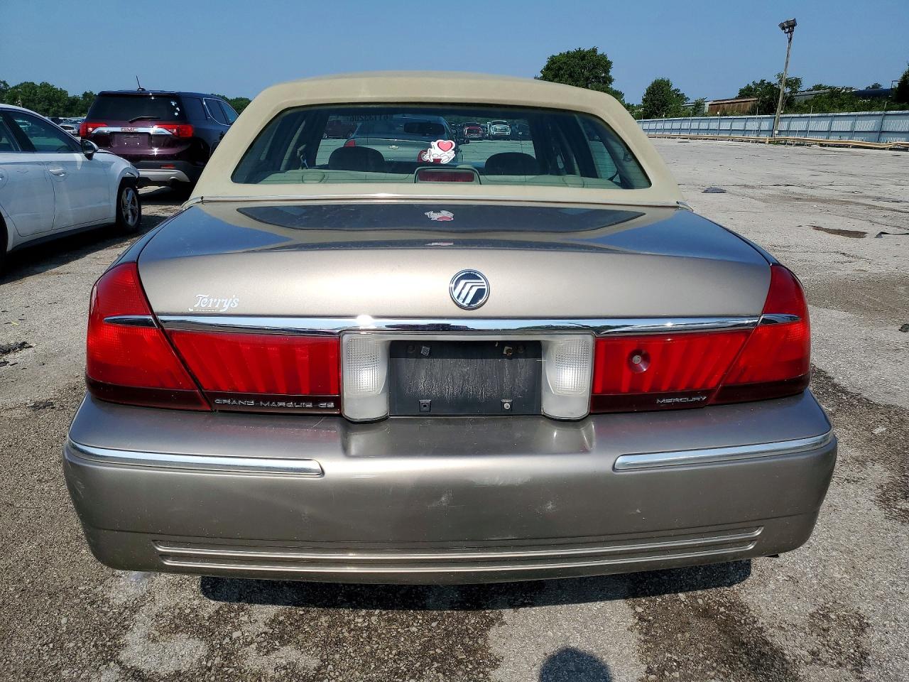 2001 Mercury Grand Marquis Gs Tan vin: 2MEFM74W11X660250